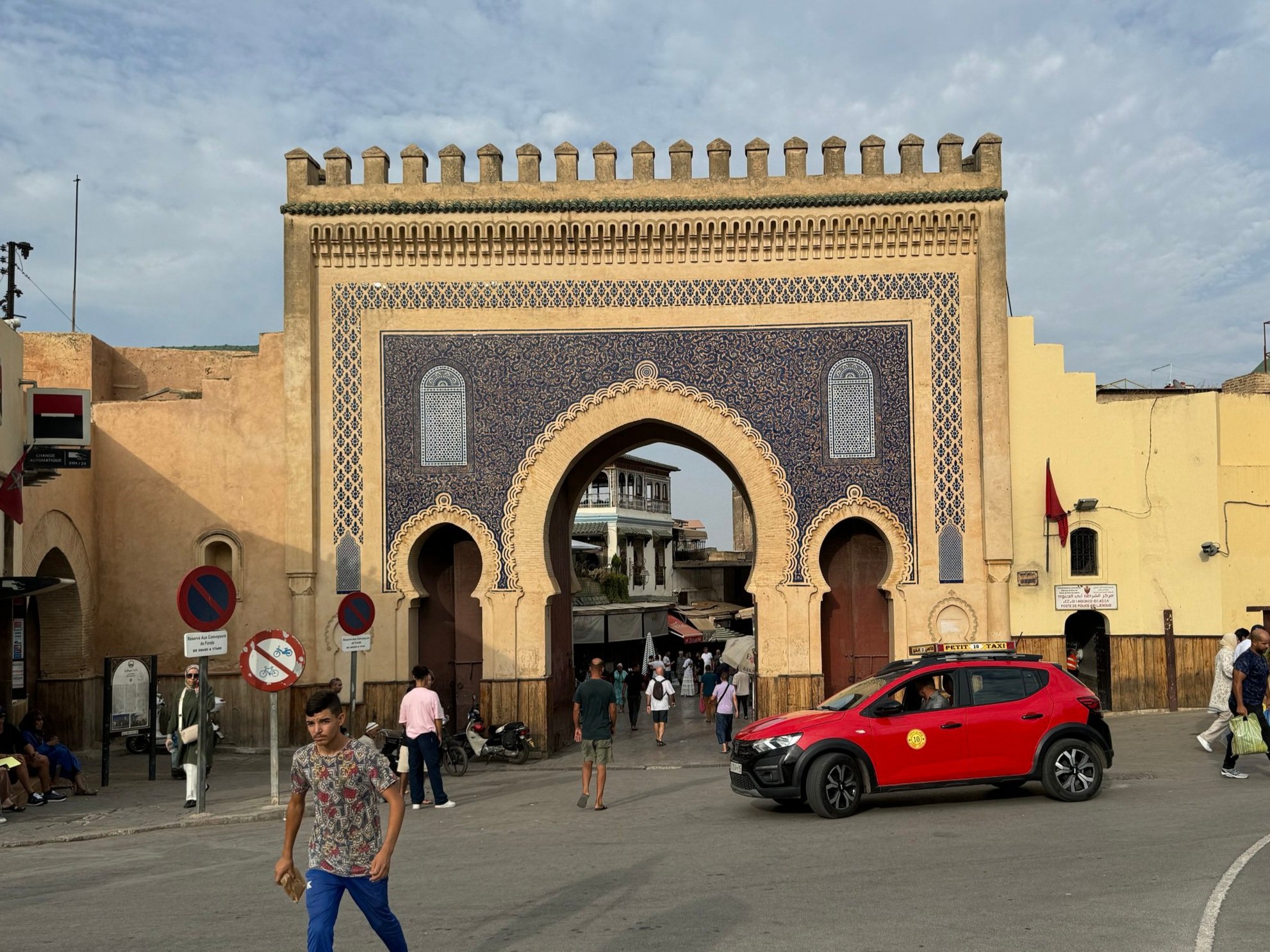 Bab Boujloud (Blue Gate) is the main entrance to the medina. It has a blue facade (the color of Fez) on the outside...