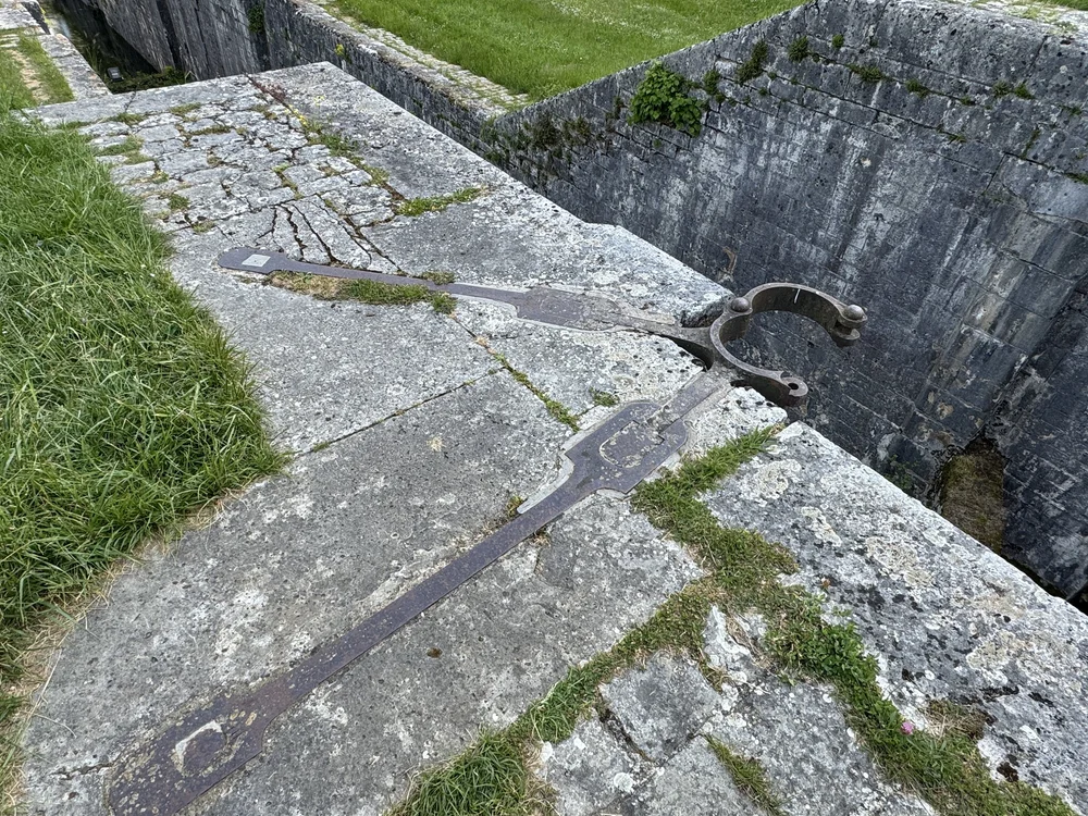   Giant hinges once held the oak lock gates.  