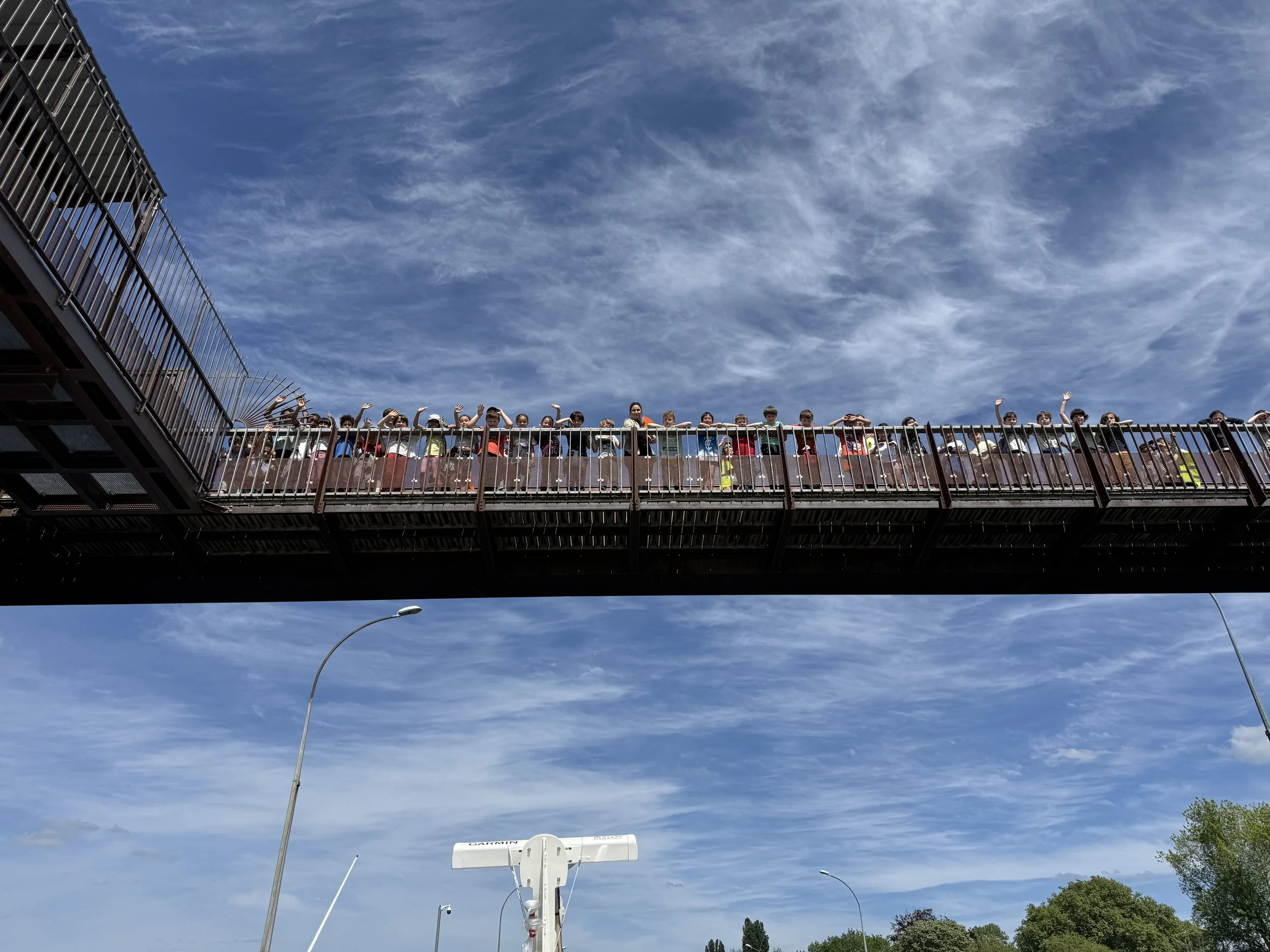   A classroom of children watched us from above.  