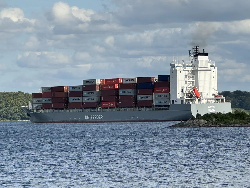   The day’s stress dissipated as we relaxed on the back deck, watching the cargo ships ease their way out of the lock.  