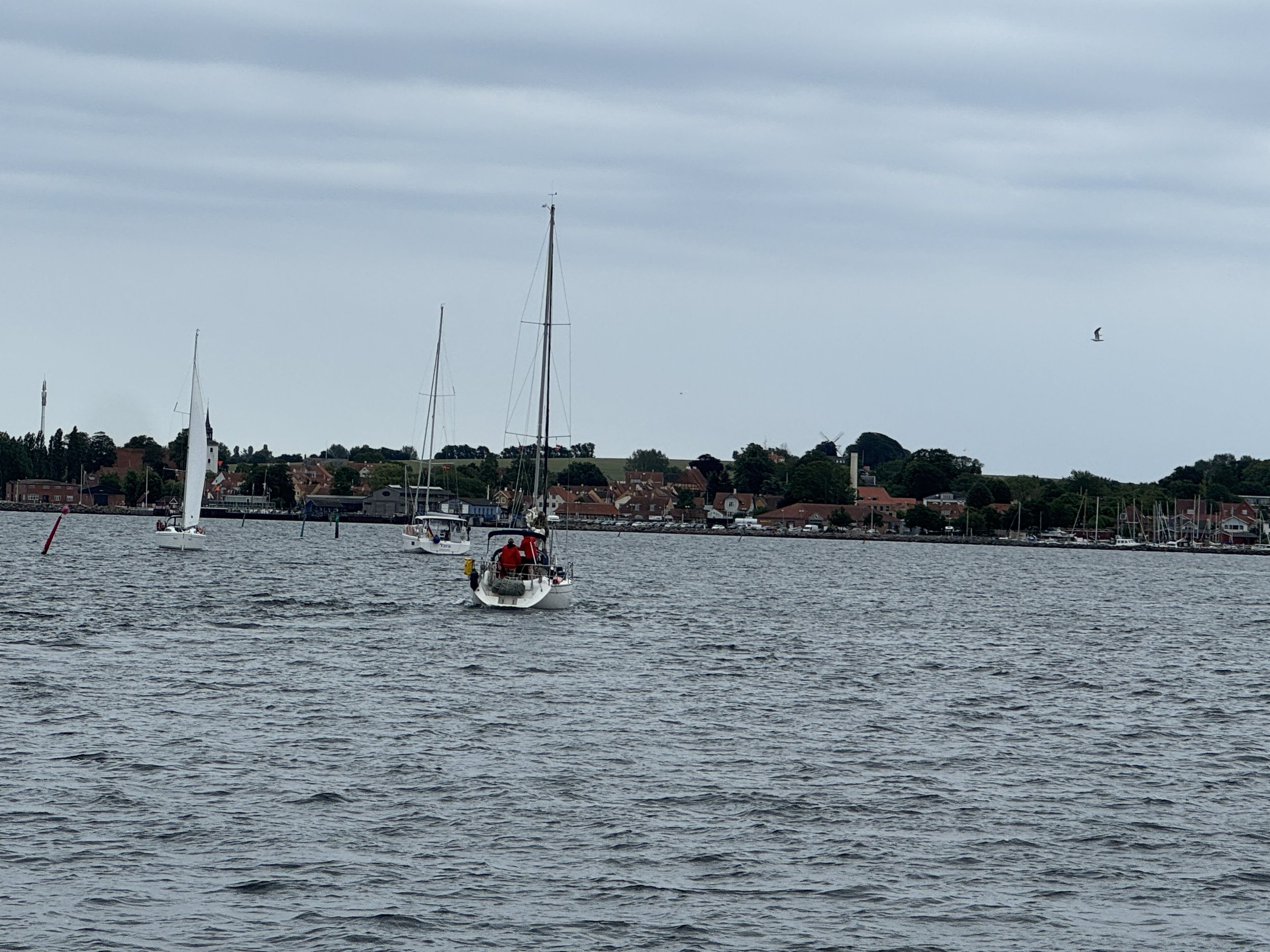   Following a parade of boats through the channel into Ærø Harbor.  