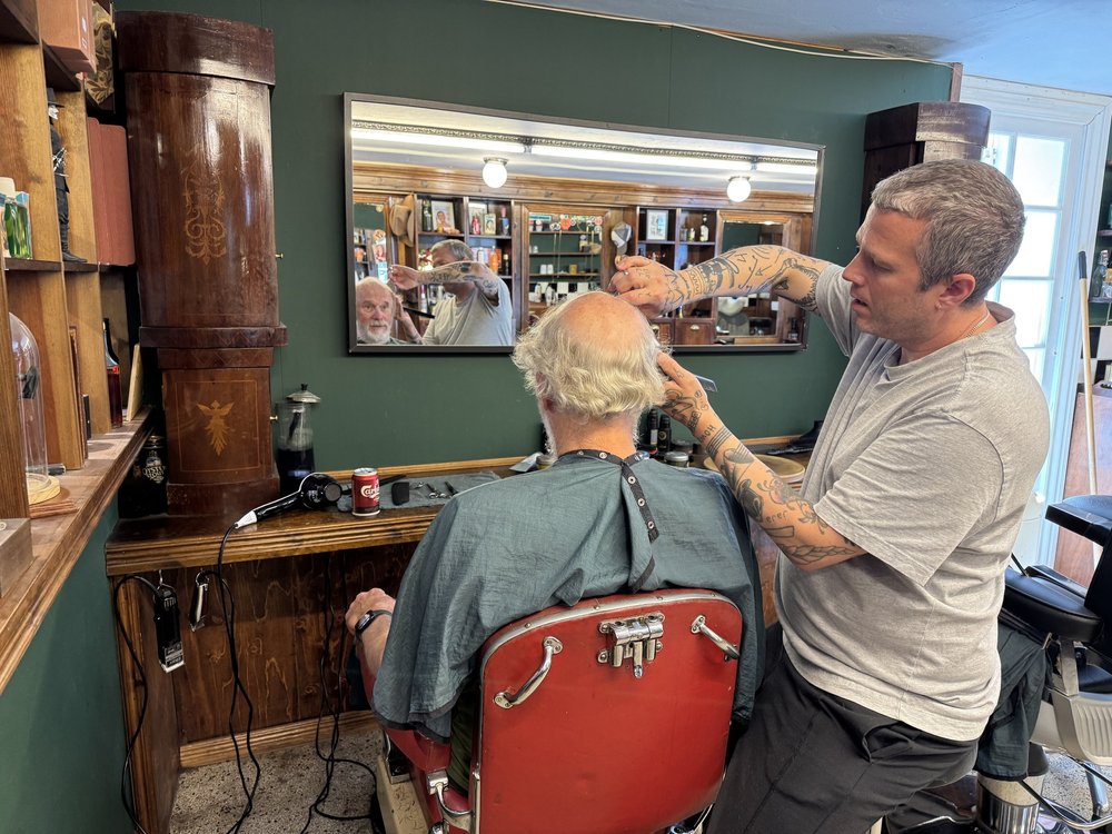  Tom got the most expensive haircut of his life - but it came with a beer so I guess it was worth it!  