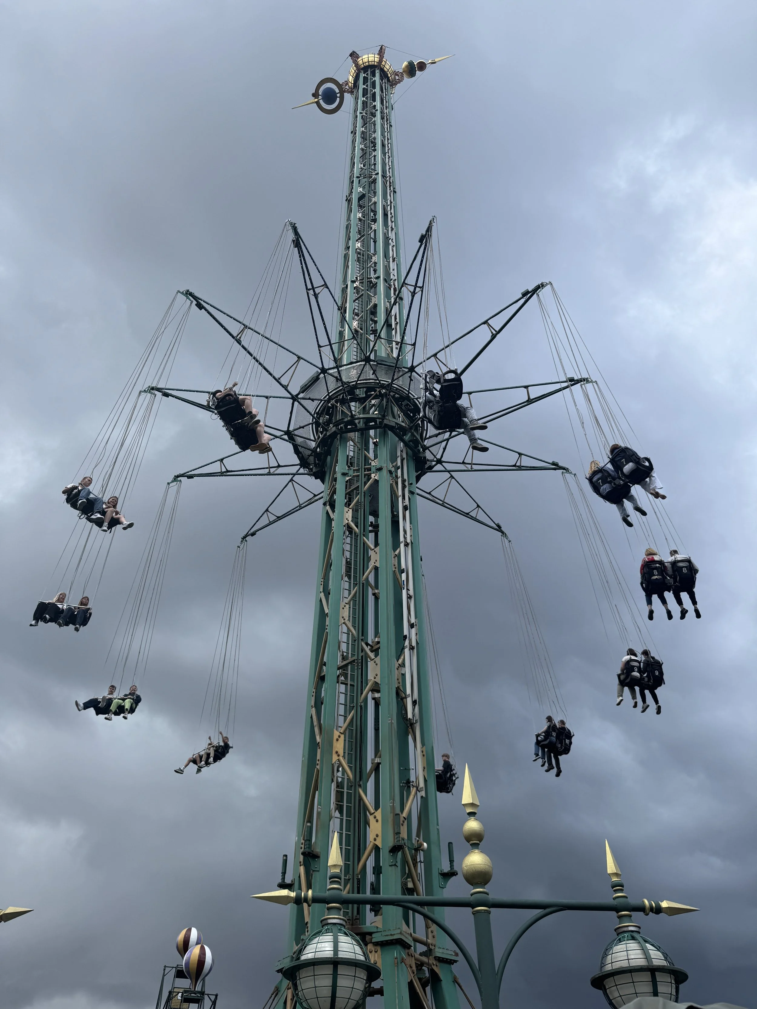   It torrentially poured on us while we rode the swings.  