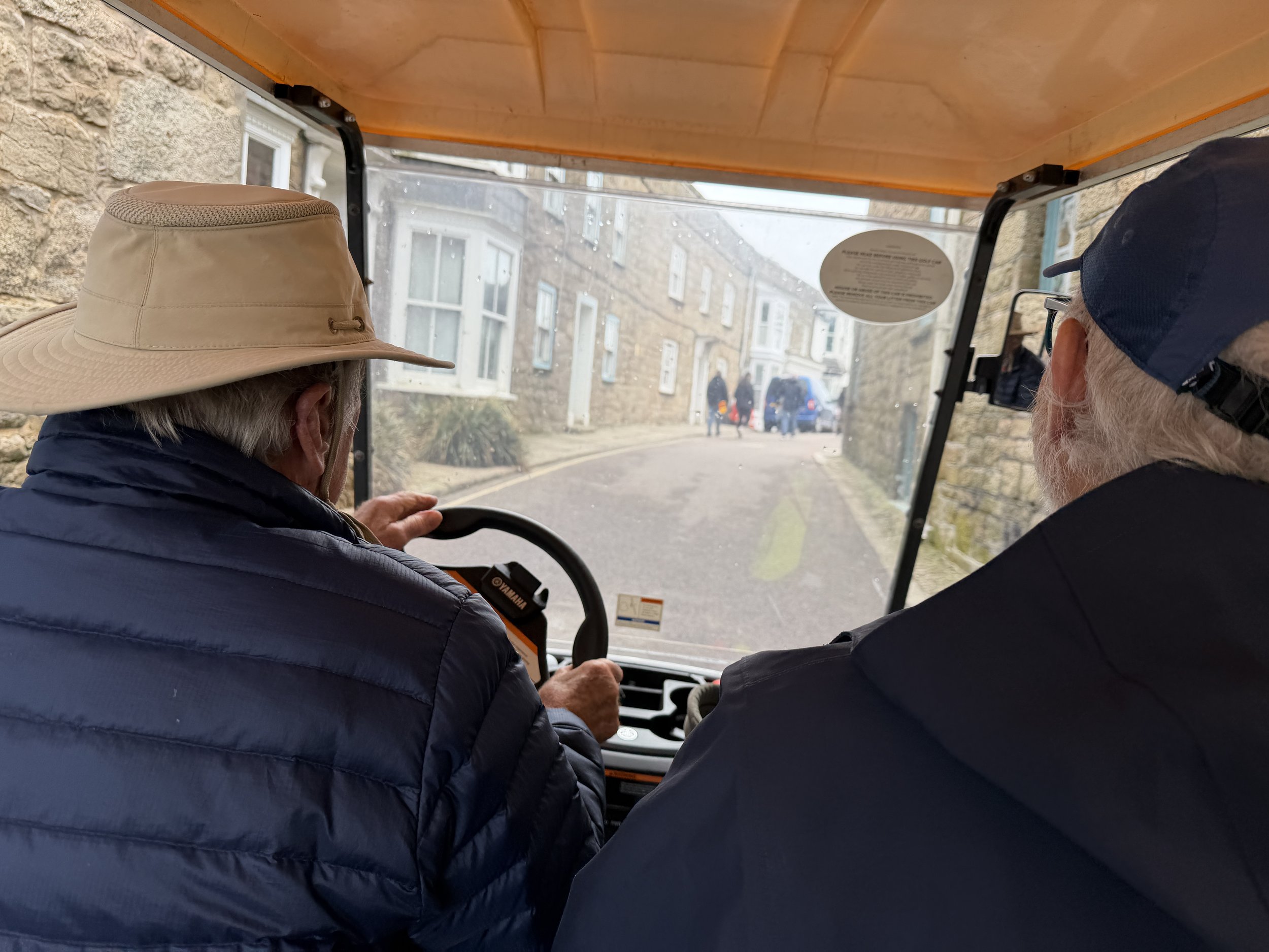   Golf cart with the steering wheel on the left - not normal in the UK.  