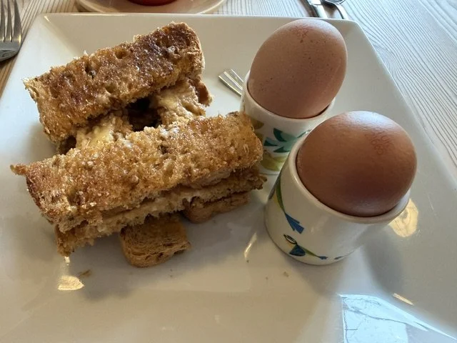  Drippy eggs with buttered soldiers.  