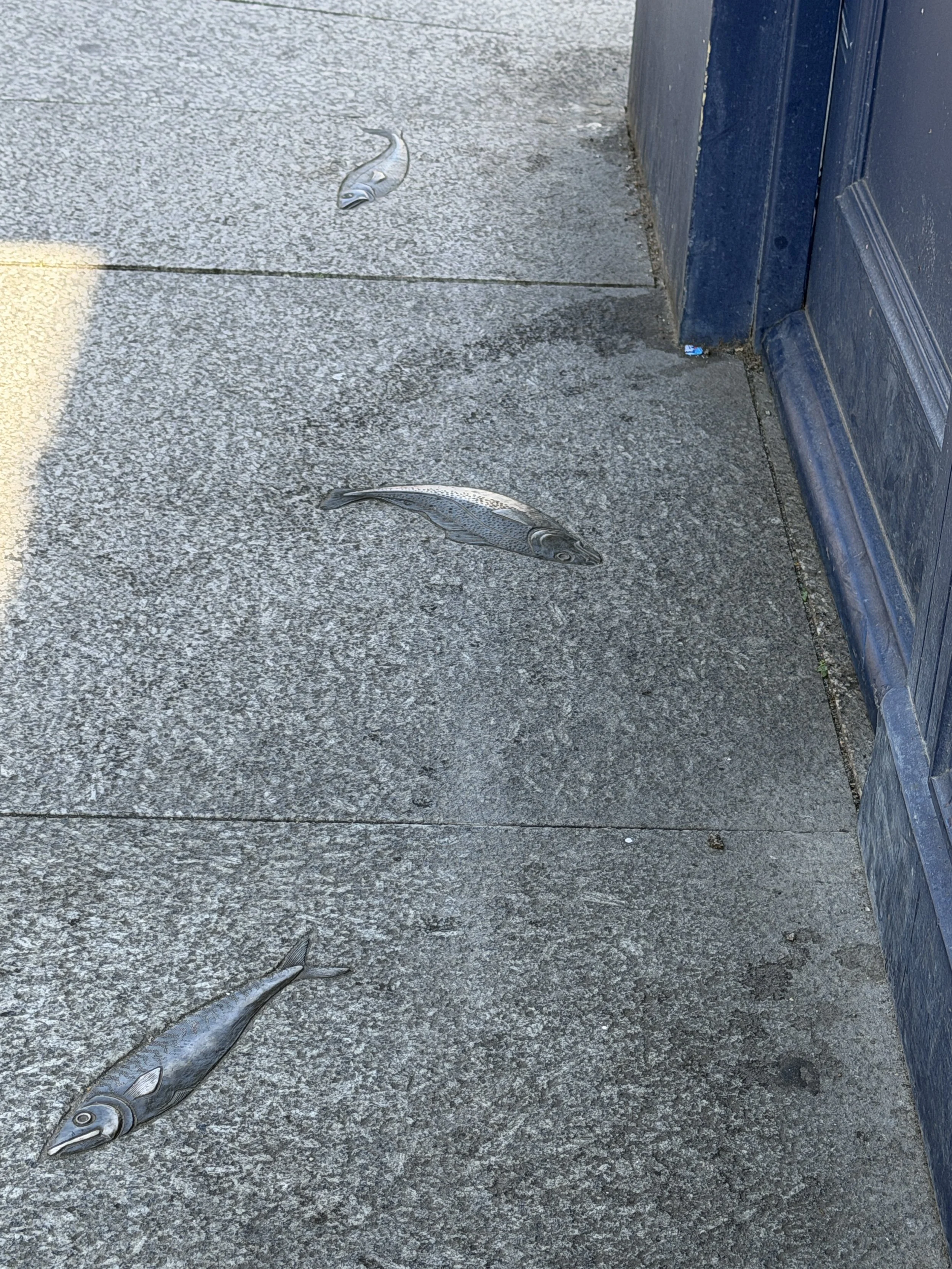   Sidewalk art that leads to the fish market.  