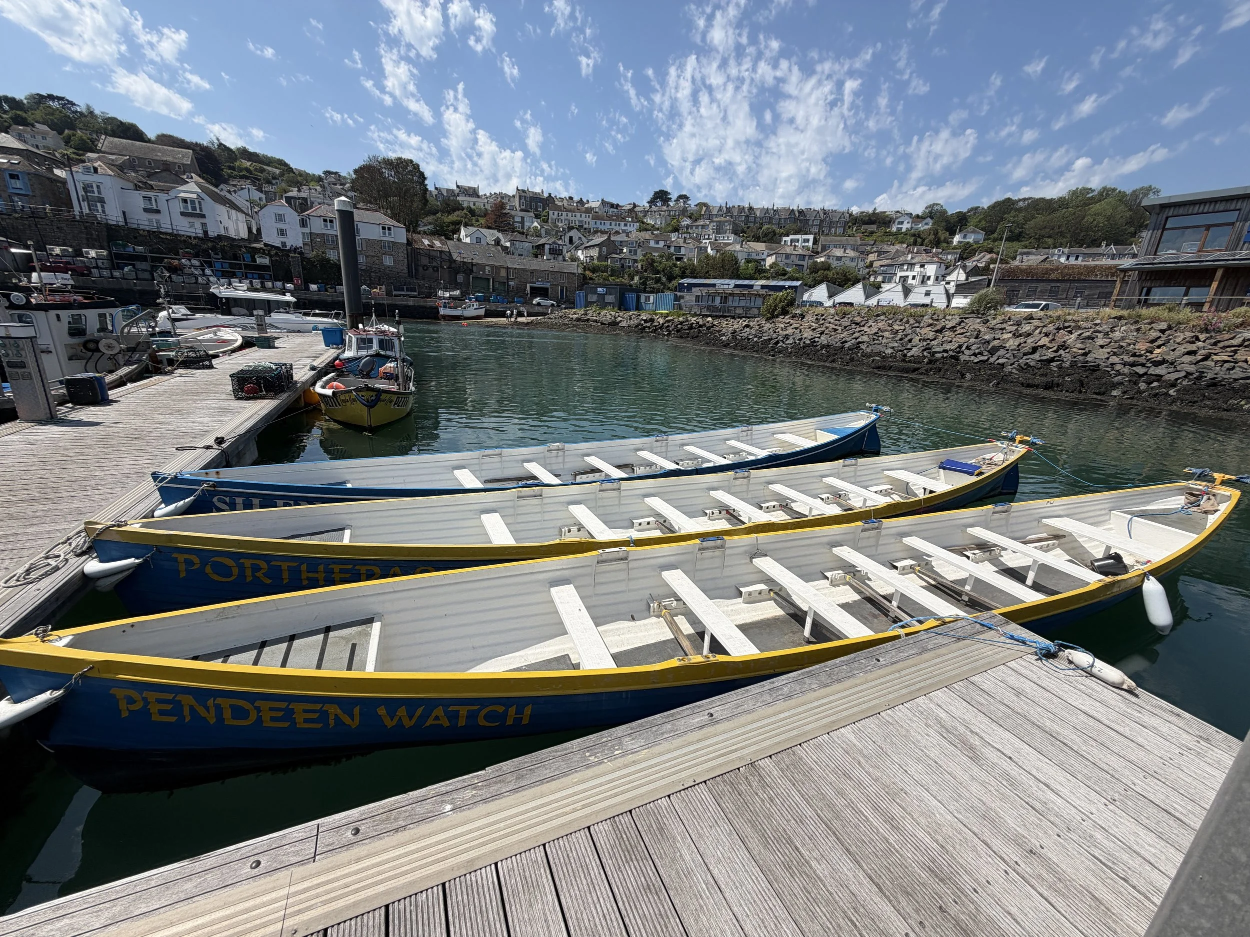   Gig boats, a traditional, narrow, wooden rowing boat.   