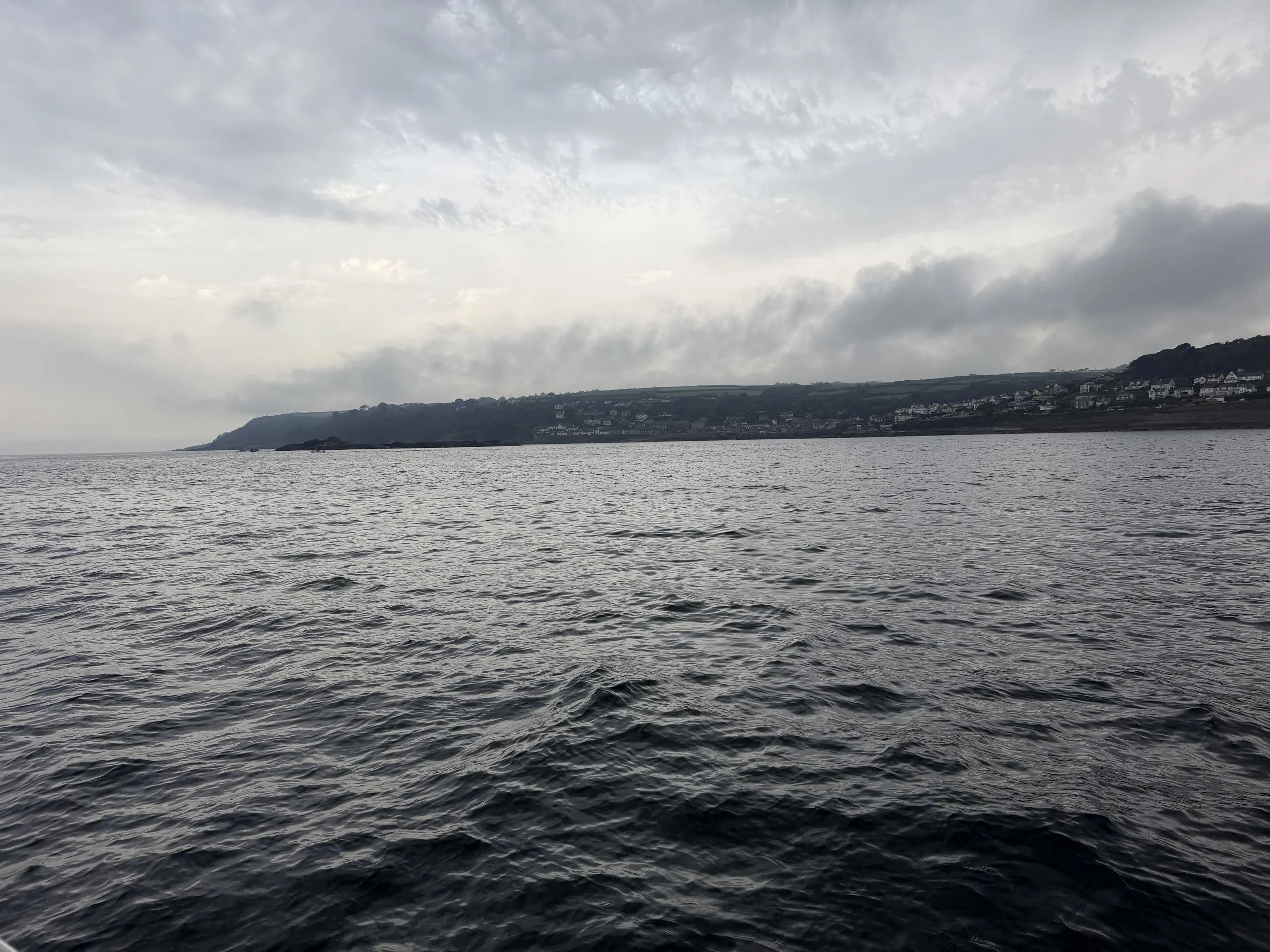   Low clouds but relatively smooth water.  