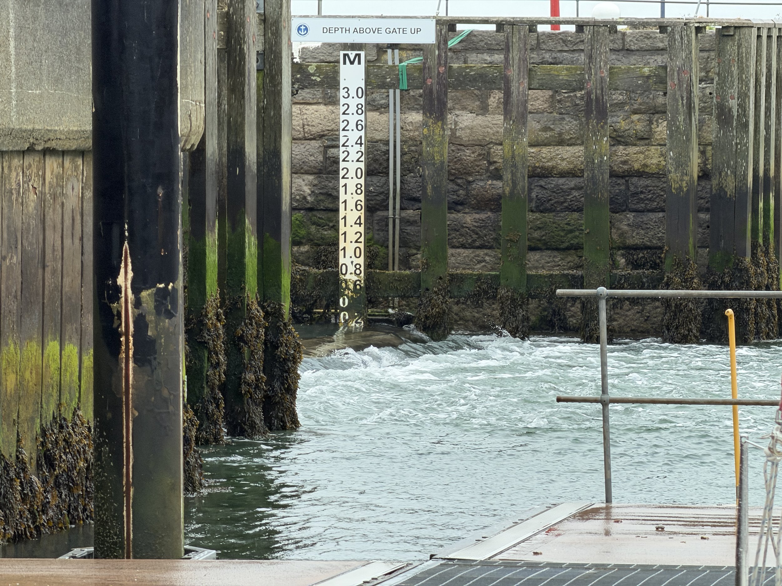   Water pours into the harbor as the tide rises.  