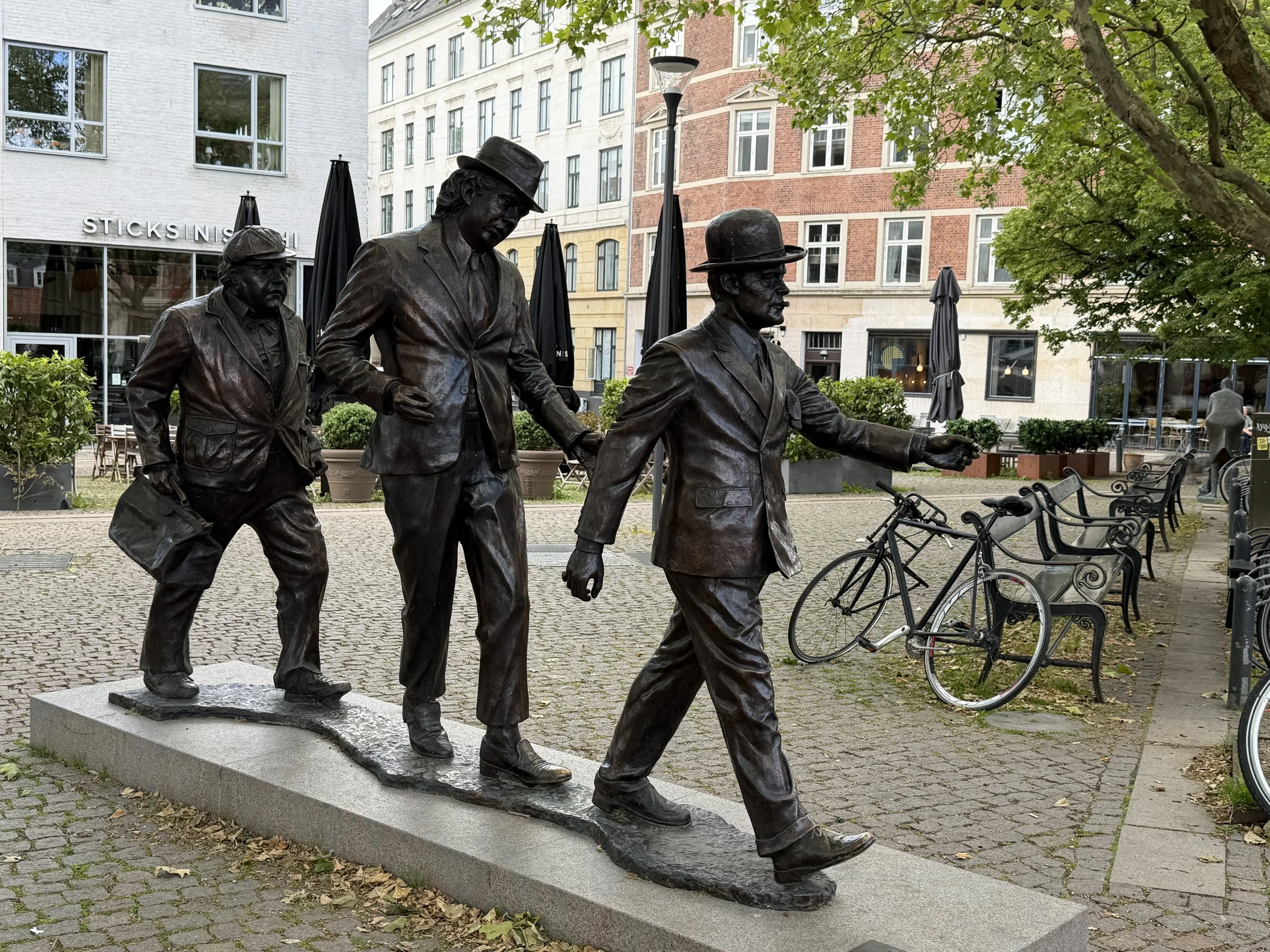   The bronze figures of The Olsen Gang, an iconic Danish comedy classic about a fun trio of criminals.  