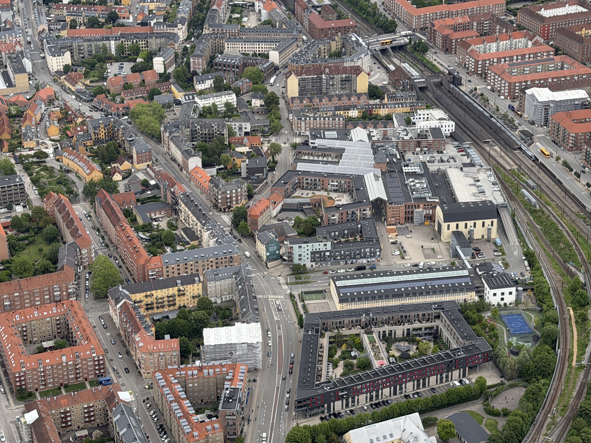   Apartment buildings are designed around a courtyard or central greenspace.  