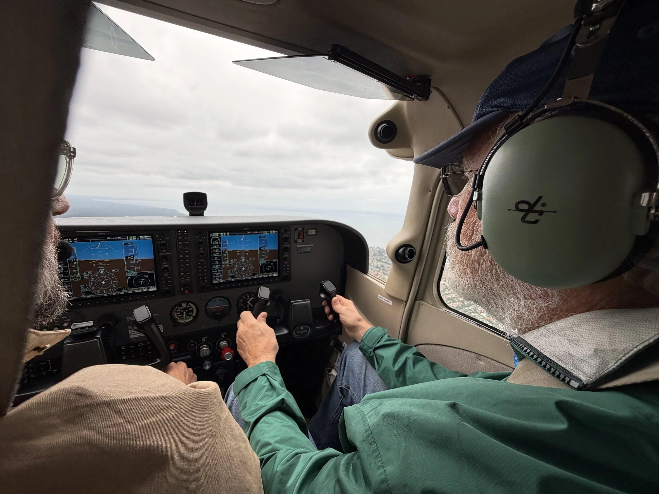   Tom takes a turn at flying  