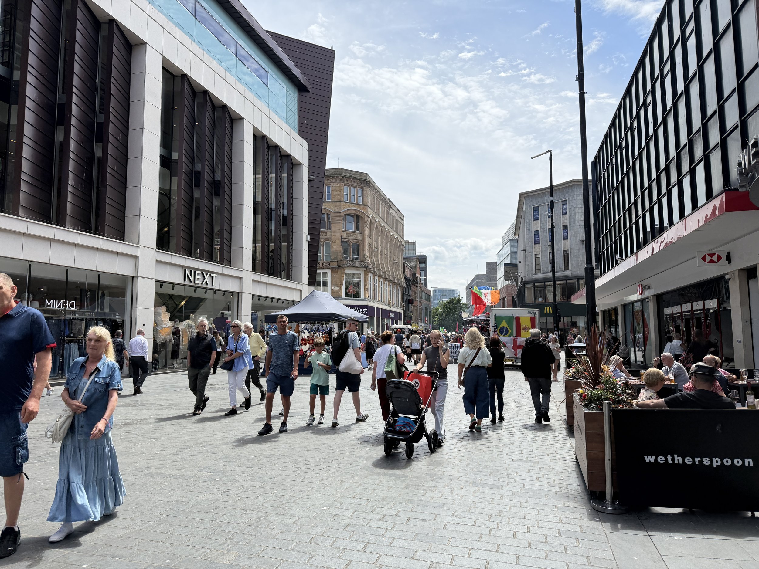   The adjacent shopping district is mobbed with people!  