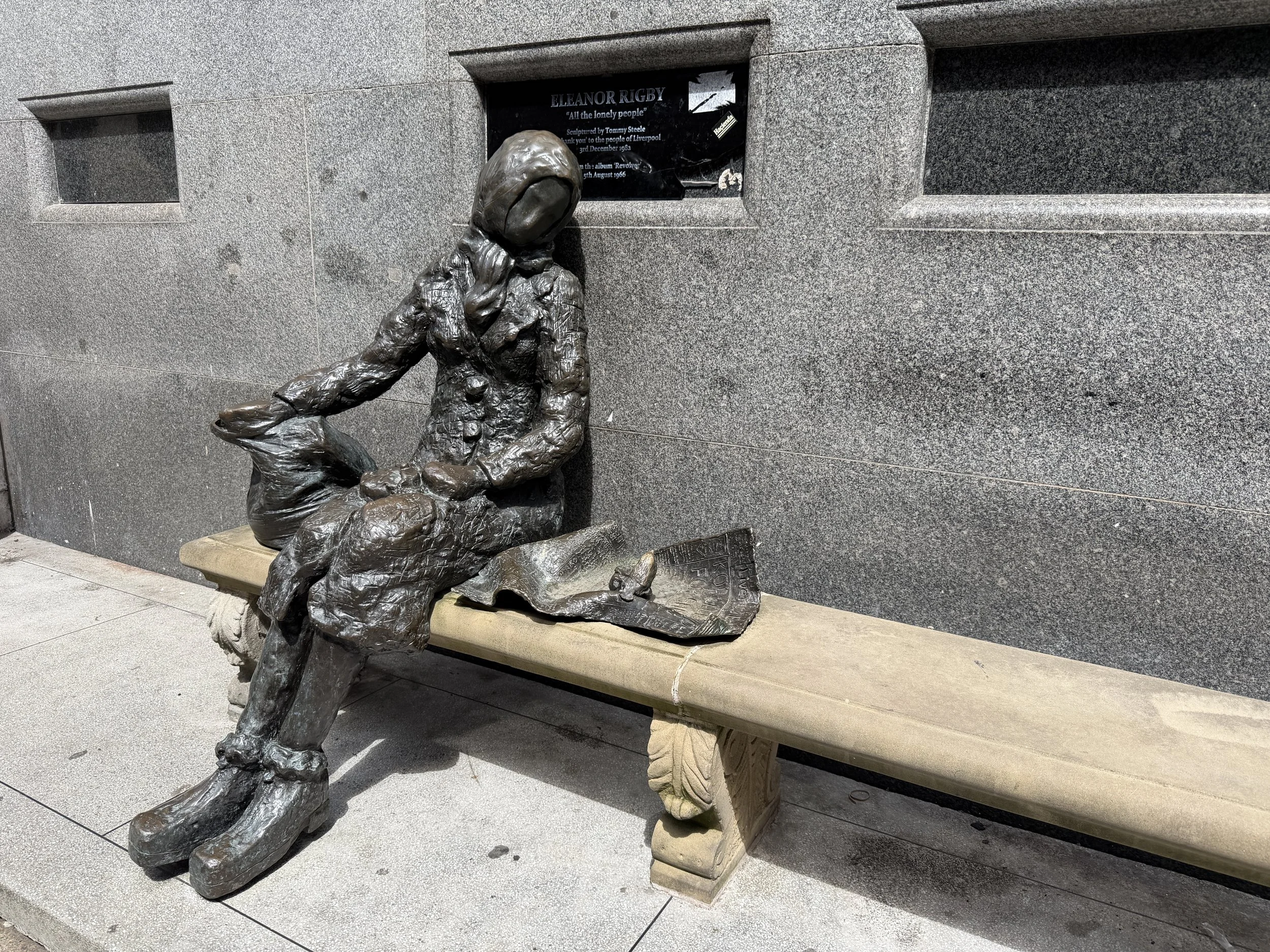  A lonely statue of Eleanor Rigby.  