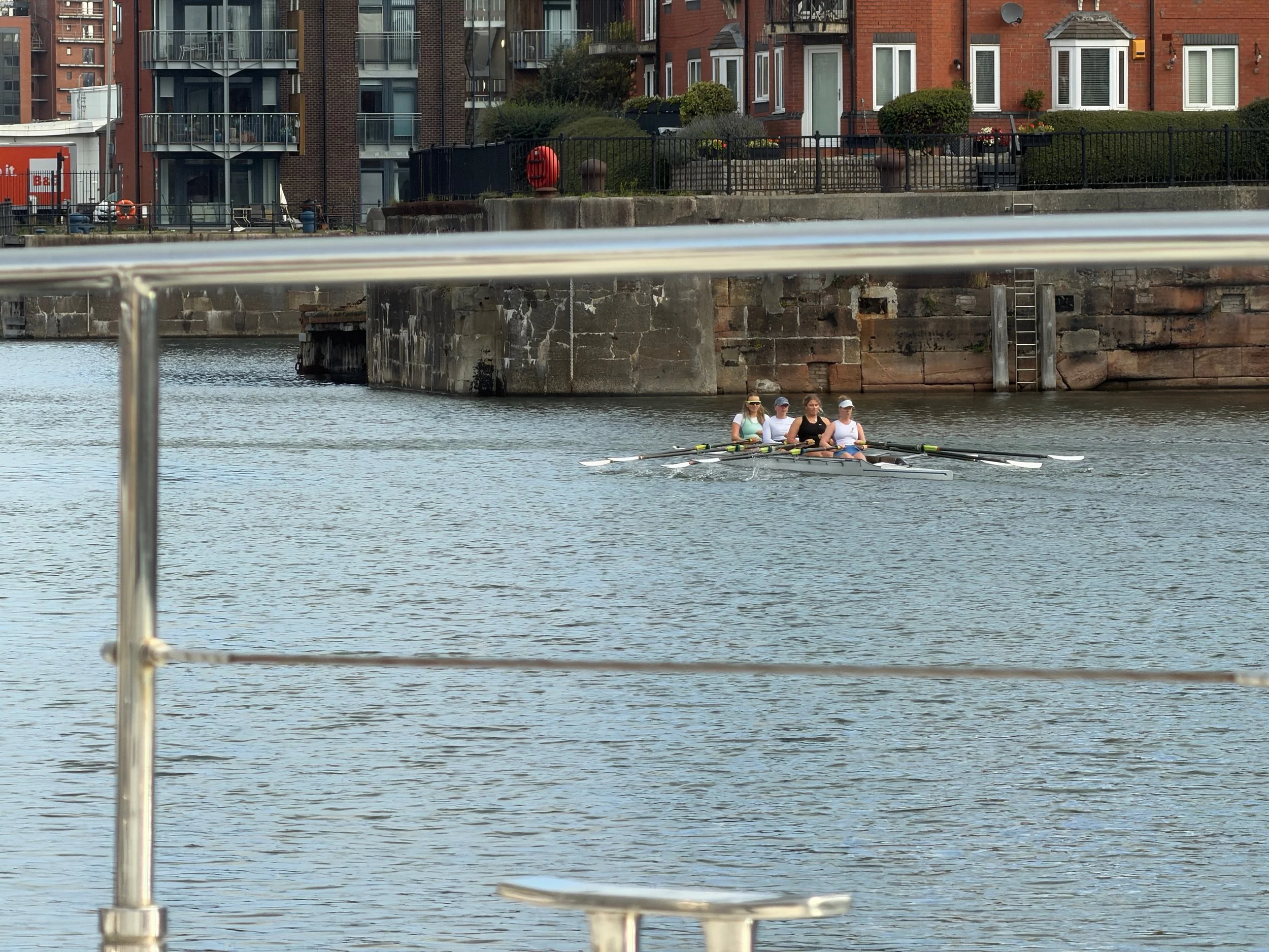   Rowing teams practice in the marina    