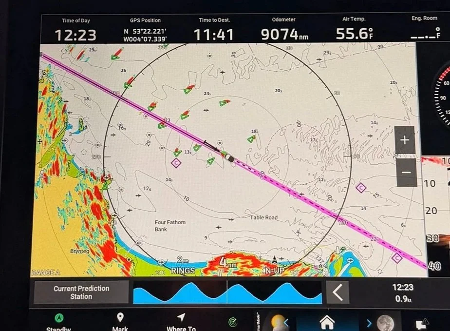     It was blowing 20 knots as they navigated through this large ship anchorage.   