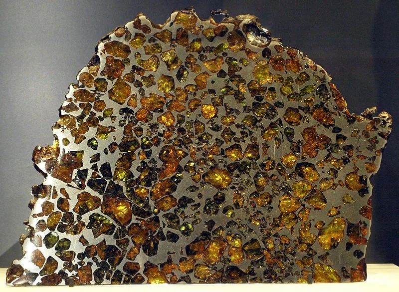 A pallasite slab with olivine.