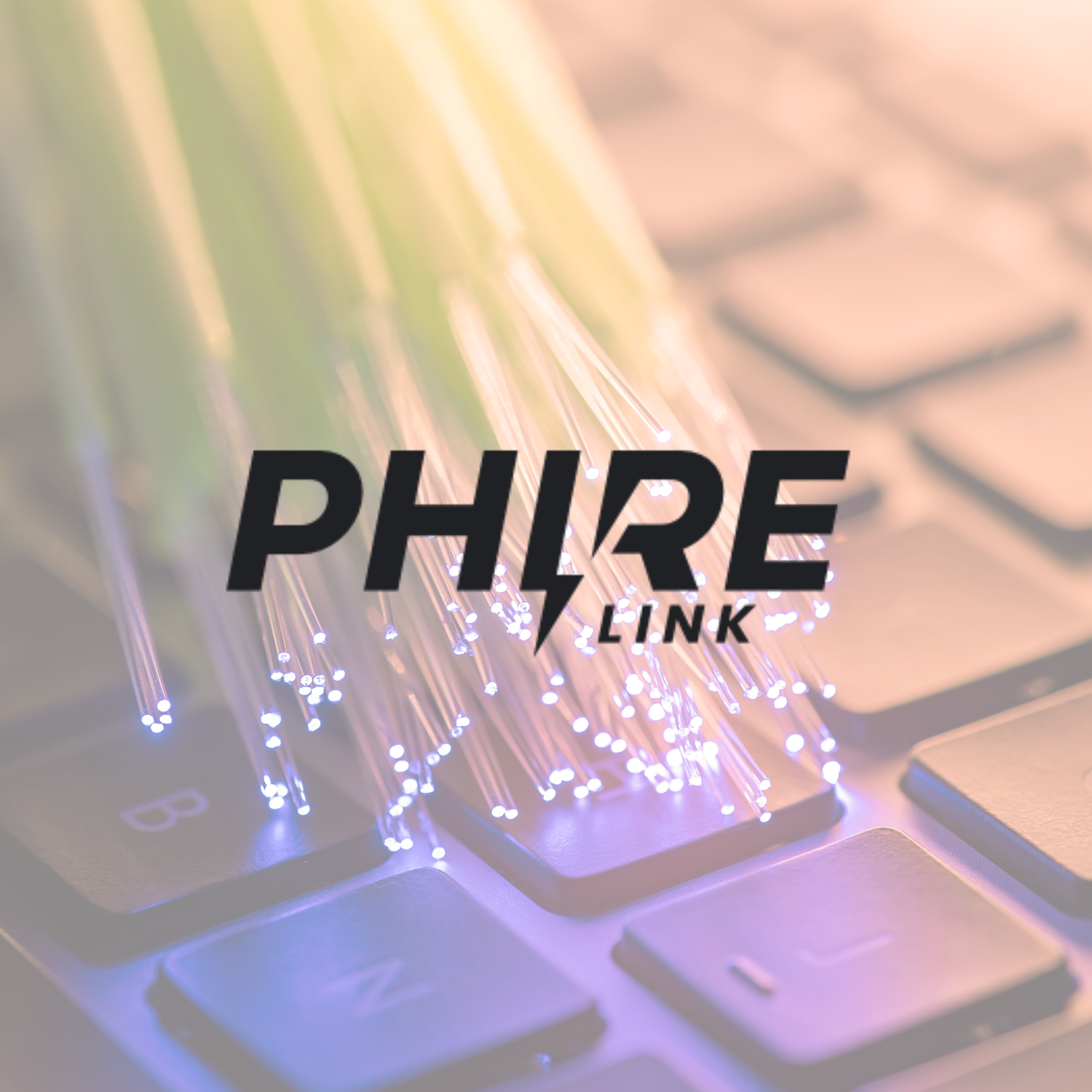 Close-up of a laptop keyboard with fiber optic light strands on the keys, with the words 'PHIRE LINK' overlaid, emphasizing technology and internet connectivity.