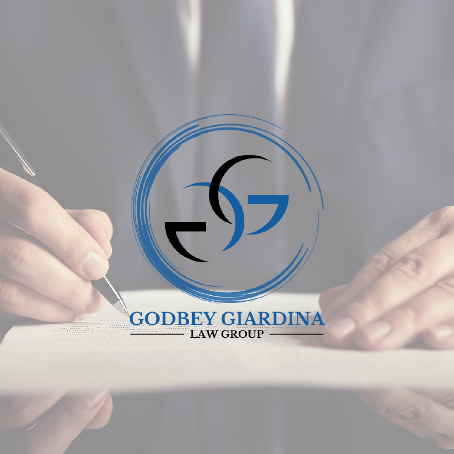 Business professional signing a document with the logo of Godbey Giardina Law Group overlayed.