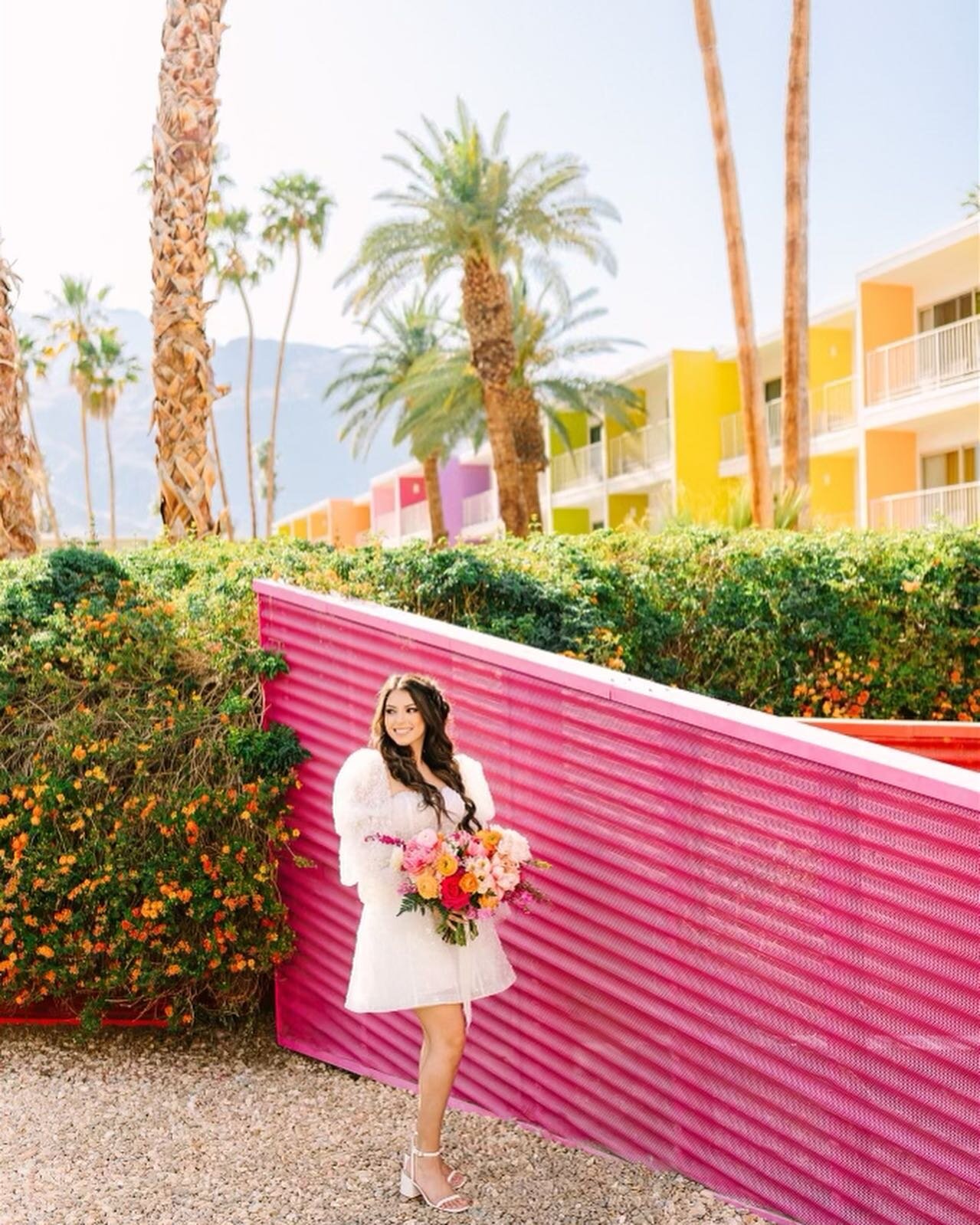 she can still make the whole room shimmer ✨ 

love seeing bride @sadiemakphotos do a photoshoot in her @angelaandalison mini 🤍

📸 @marycostaphoto 

#blushingbride #realbride #wedding #weddingdress #weddinggown #dress #palmsprings #bridal #newlyweds