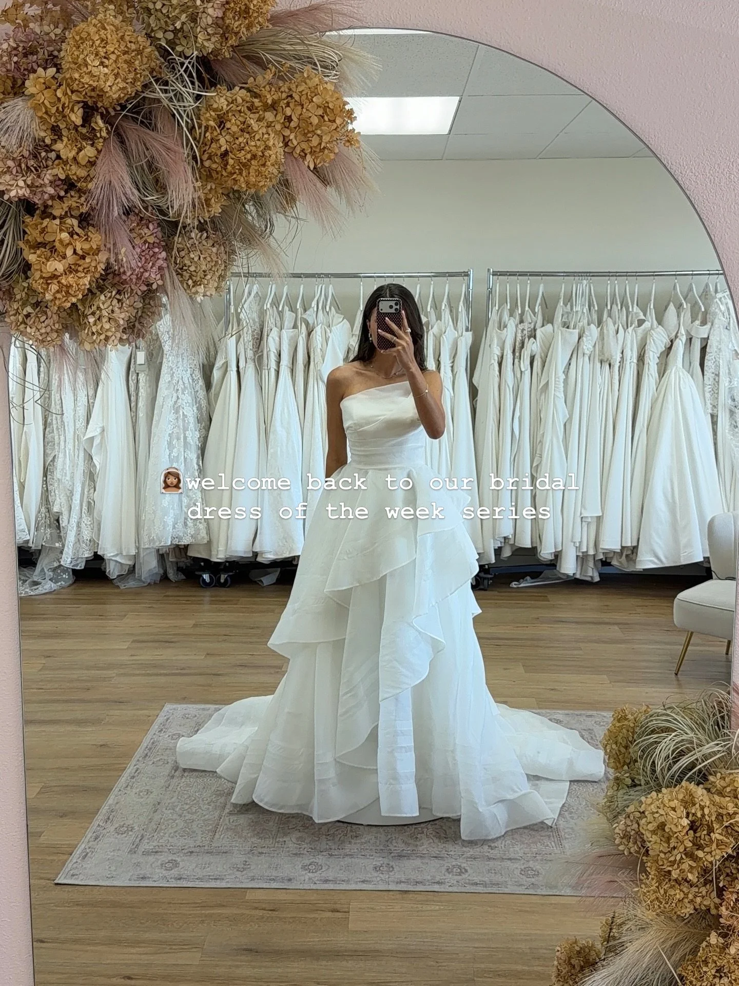 👰🏽&zwj;♀️welcome back to our bridal dress of the week series&hellip; where we show you our absolute favorites in the shop!!!

this asymmetrical strapless gown features a softly draped neckline, a cinched waist, and dramatic cascading tiers that mov