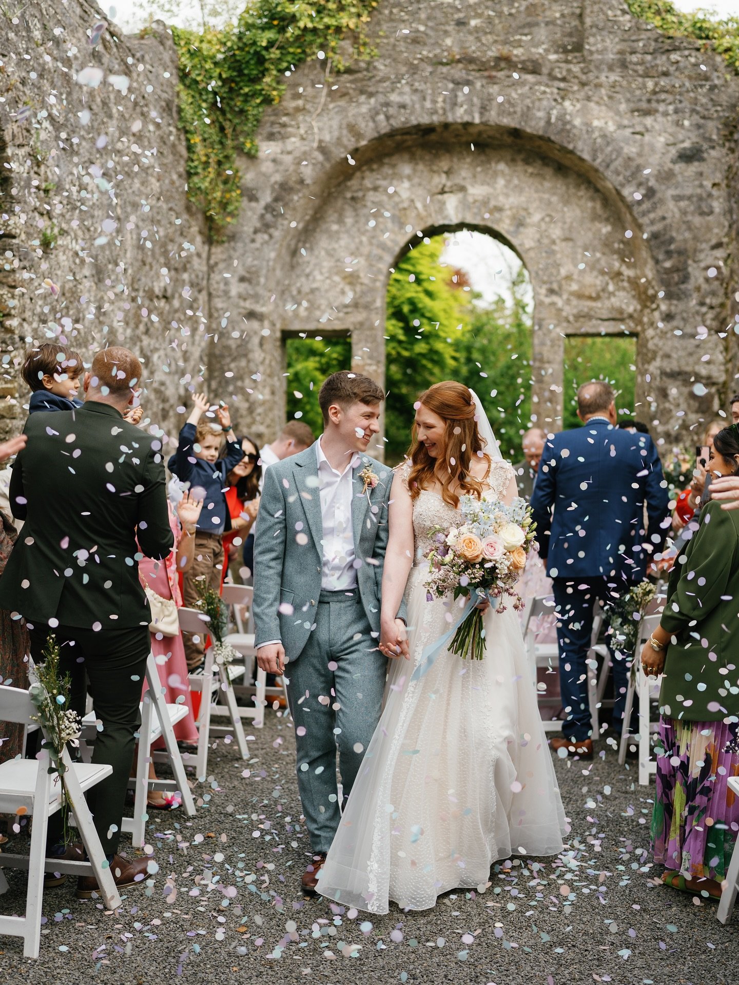 I truly have the best job in the world ! How gorgeous is this photo of Caoilfhionn &amp; &Eacute;anna ✨ Conffetti adds so much magic to pictures. When I asked them what they are looking forward to the most, walking down the aisle together was one of 