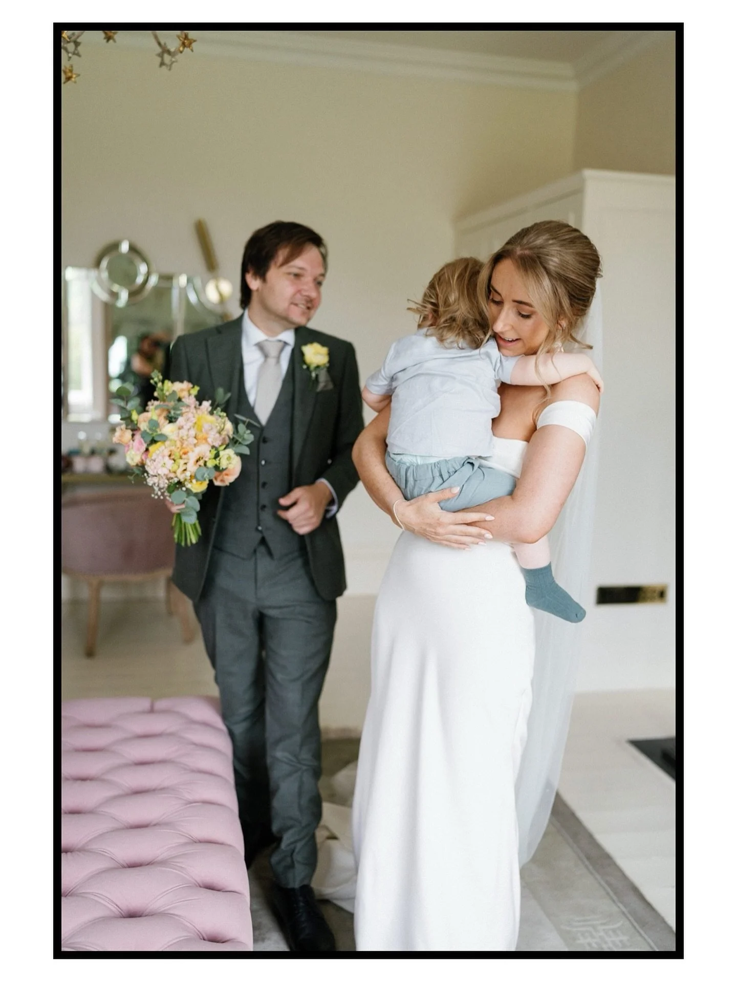 A special moment before the ceremony. After Susan &amp; Nicky&rsquo;s first look they wanted to spend a few minutes with their son, to calm, cuddle and hang out with him. I was lucky to be allowed in the room during this time. It was never a planned 