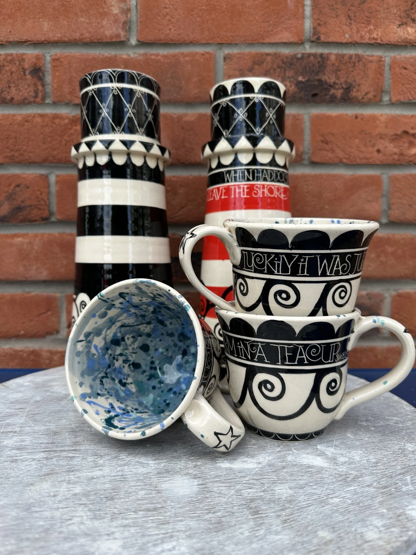 Lighthouses and Storm in a Teacup Mugs.jpg