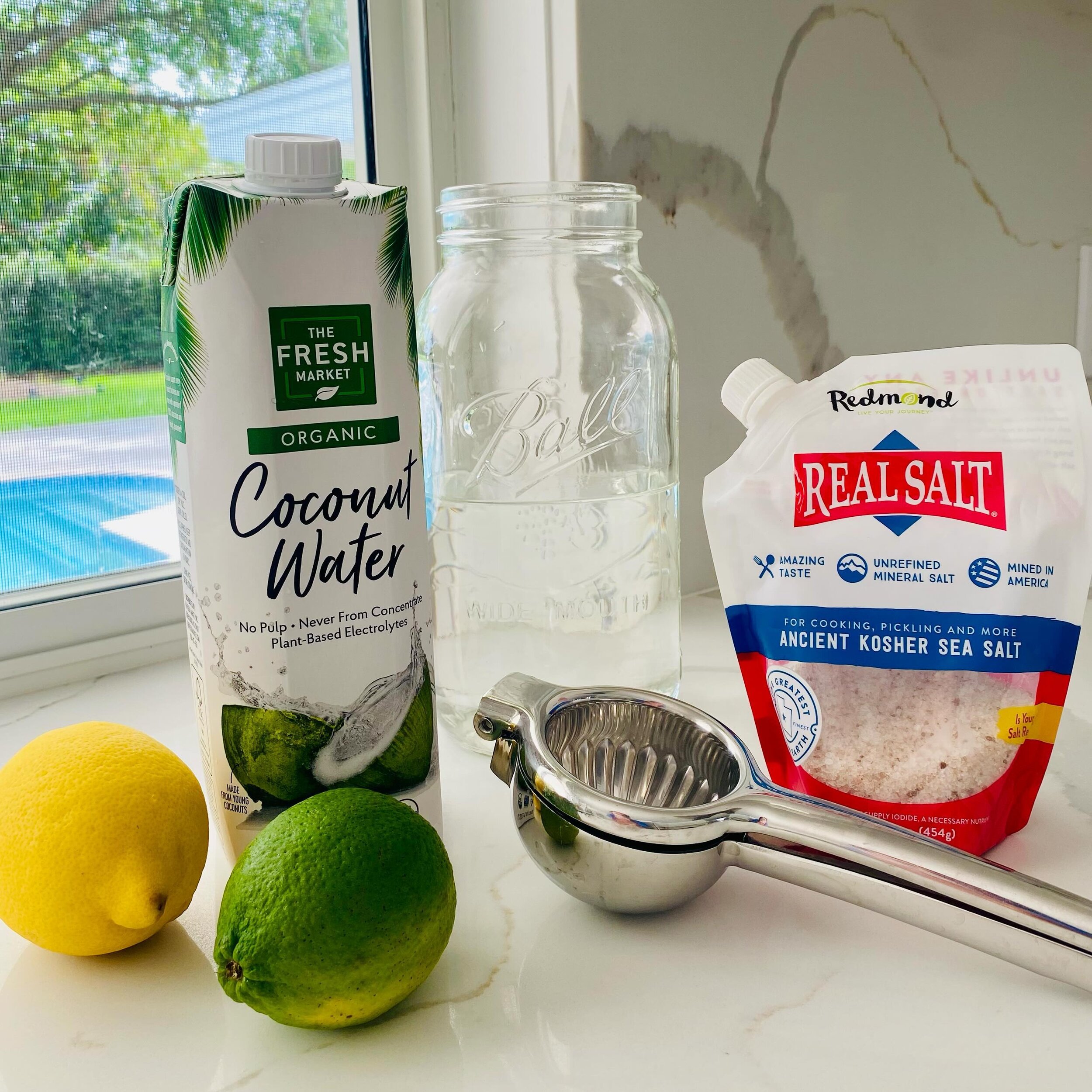 a better for you #electrolyte drink you&rsquo;ll love 🍋💦

1/2 organic coconut water
1/2 filtered water
1/2-1 whole squeezed lemon 
1/2-1 whole squeezed lime
a pinch to 1 tsp mineral salt of choice @redmondrealsalt 

*adjust according to your cup/co