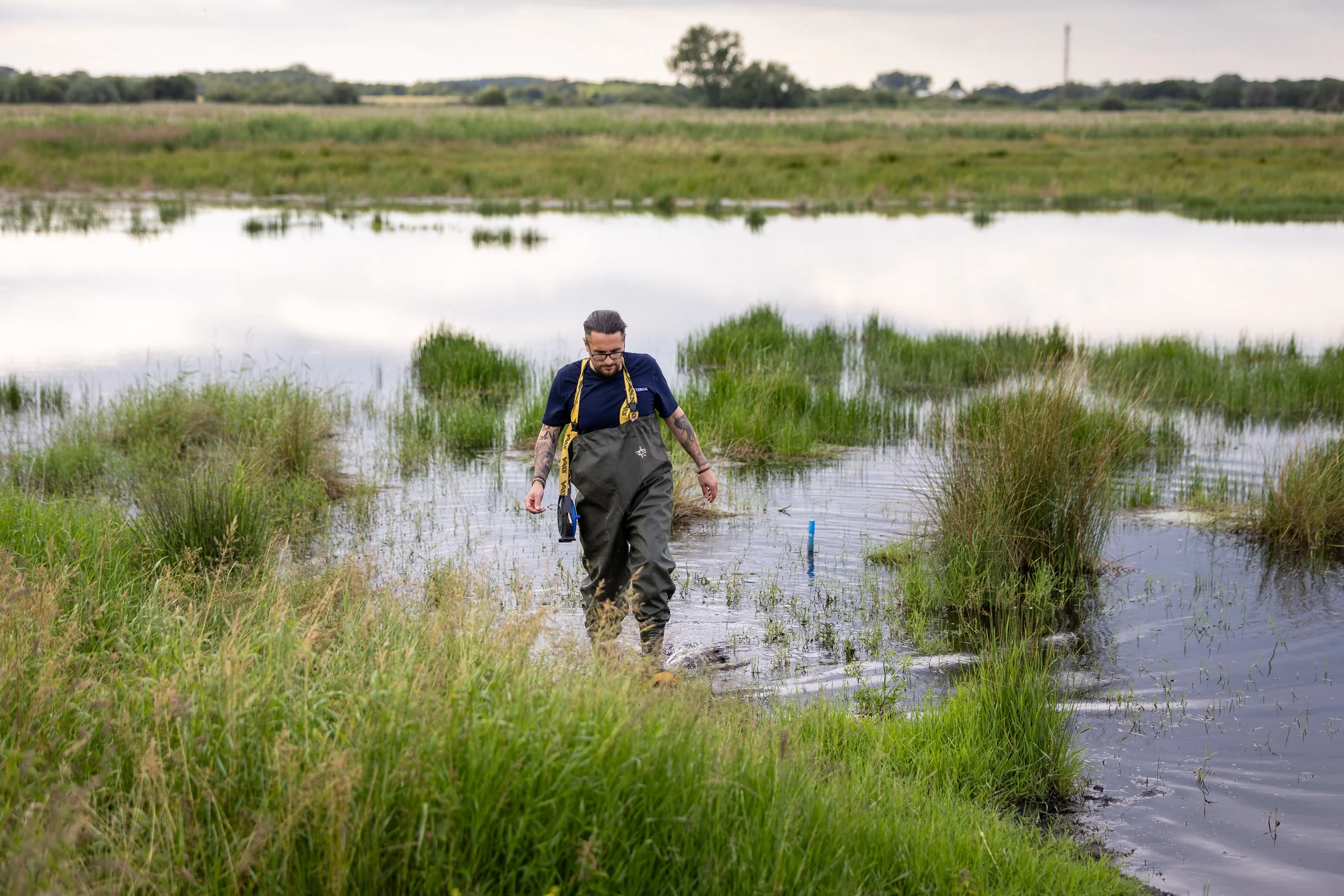 Frank walking through High Fen Wildland