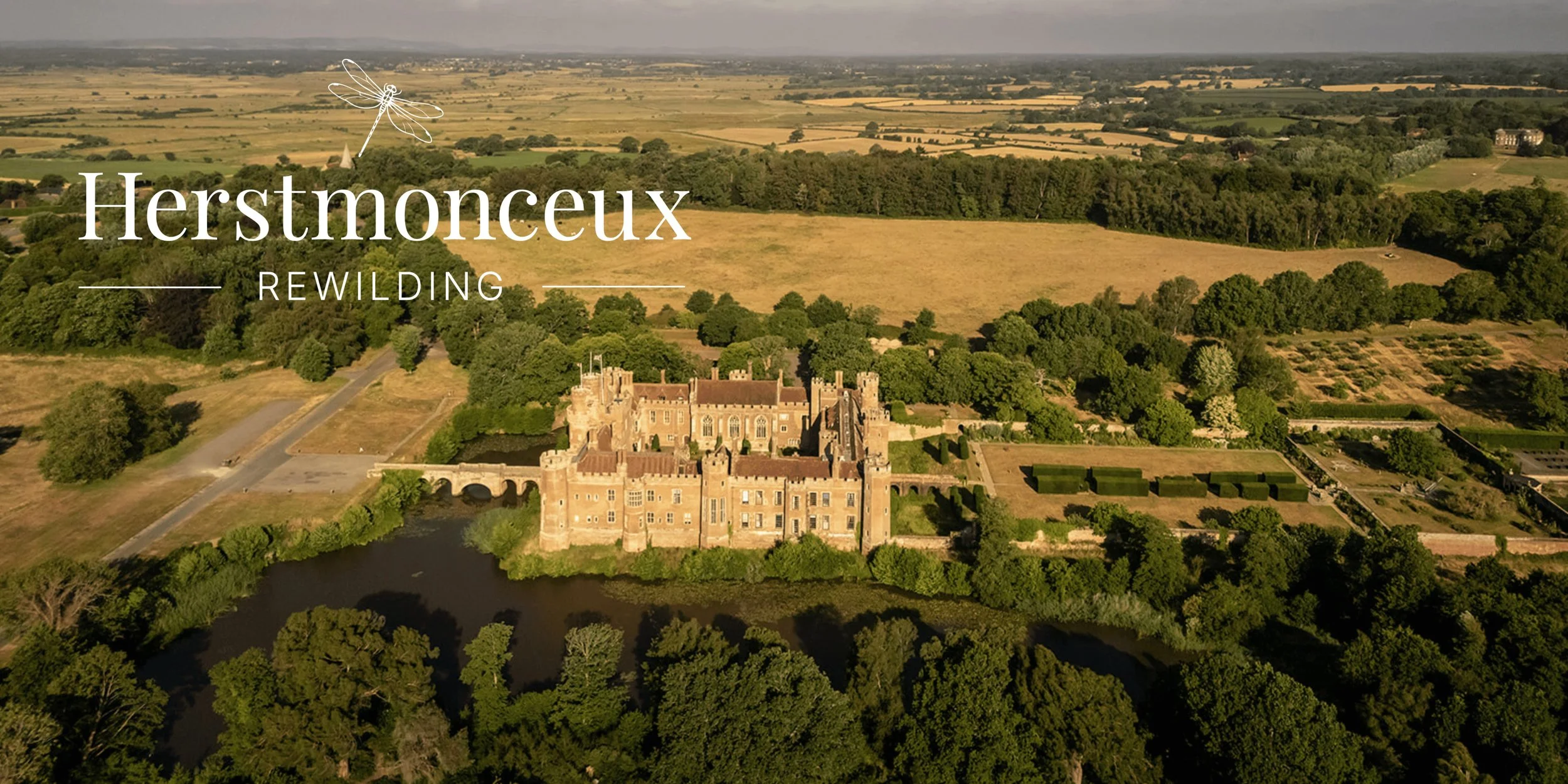 Herstmonceux Castle with Rewilding logo