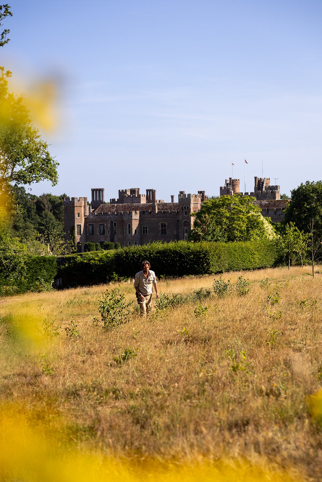 A person walking on the Herstmonceux Castle estate
