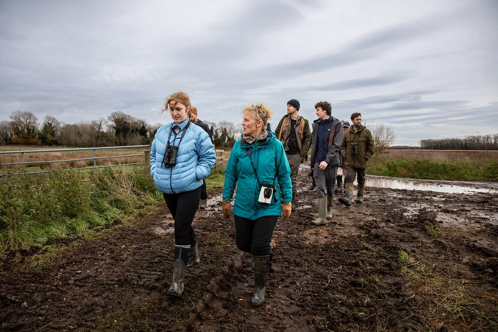 People walking through High Fen Wildland