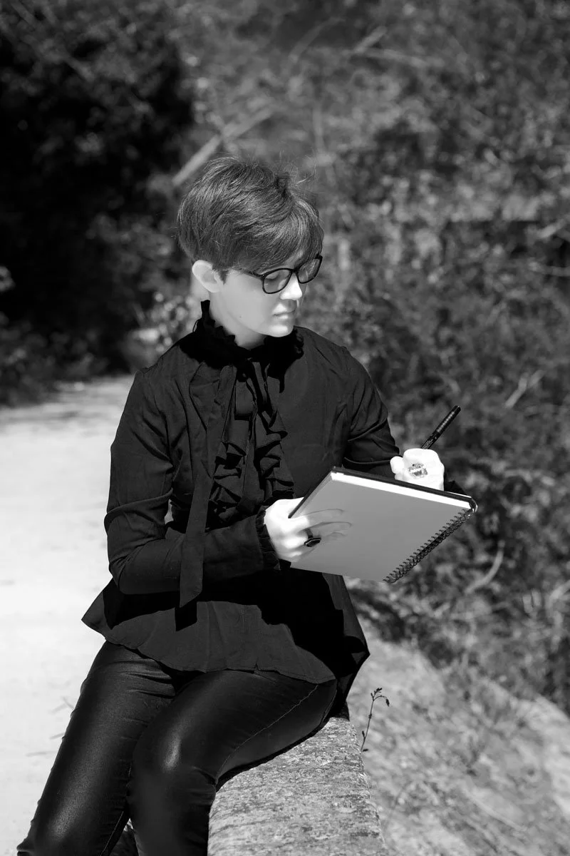 Image of pattern designer Hollie Quinn sketching on location