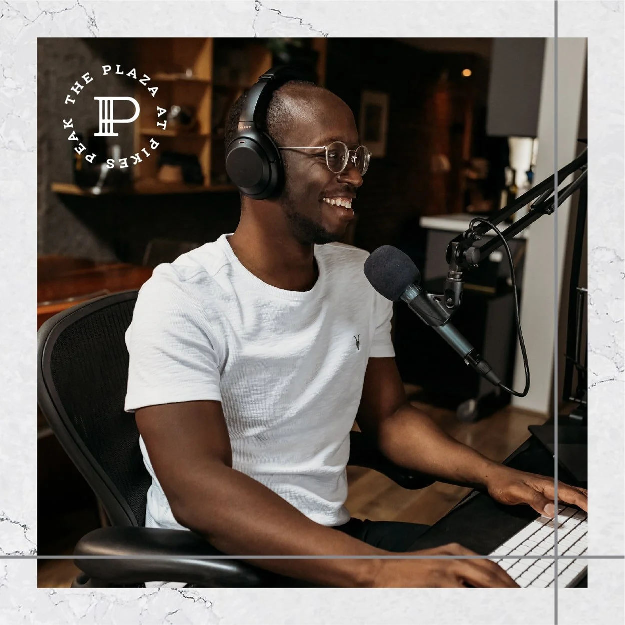 Plaza at Pikes Peak lifestyle image with badge design and texture