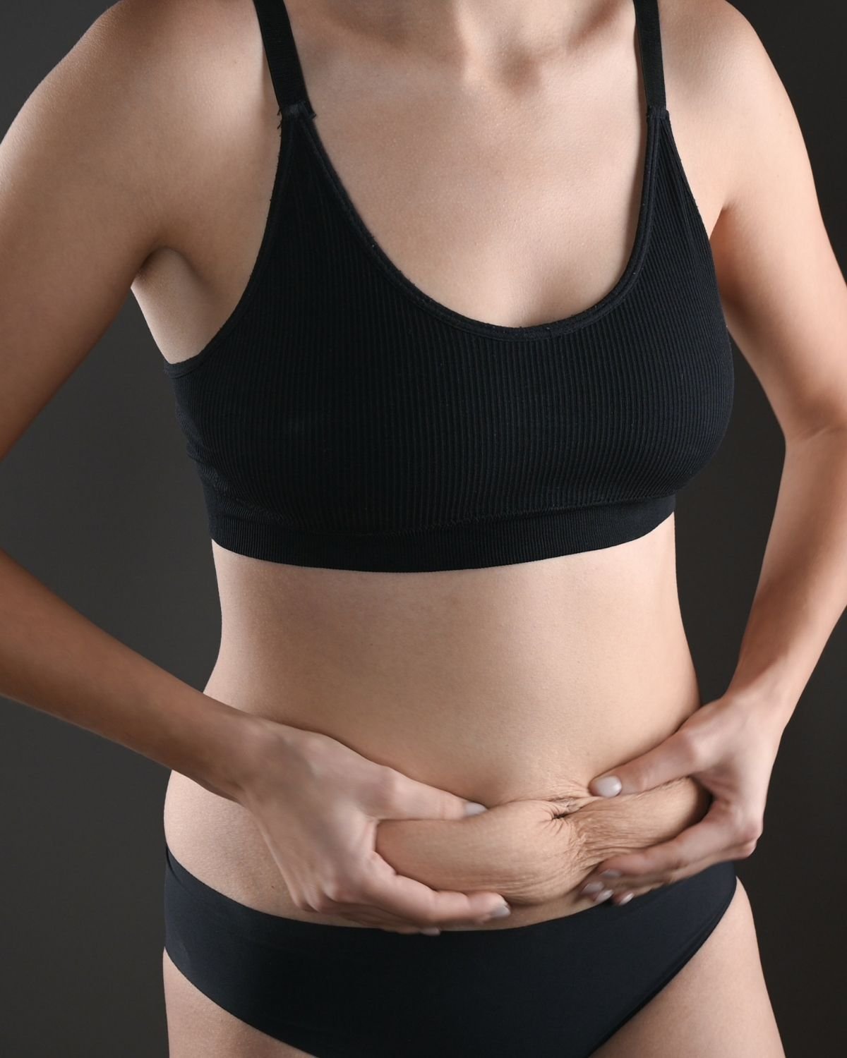 Woman with extra belly flab
