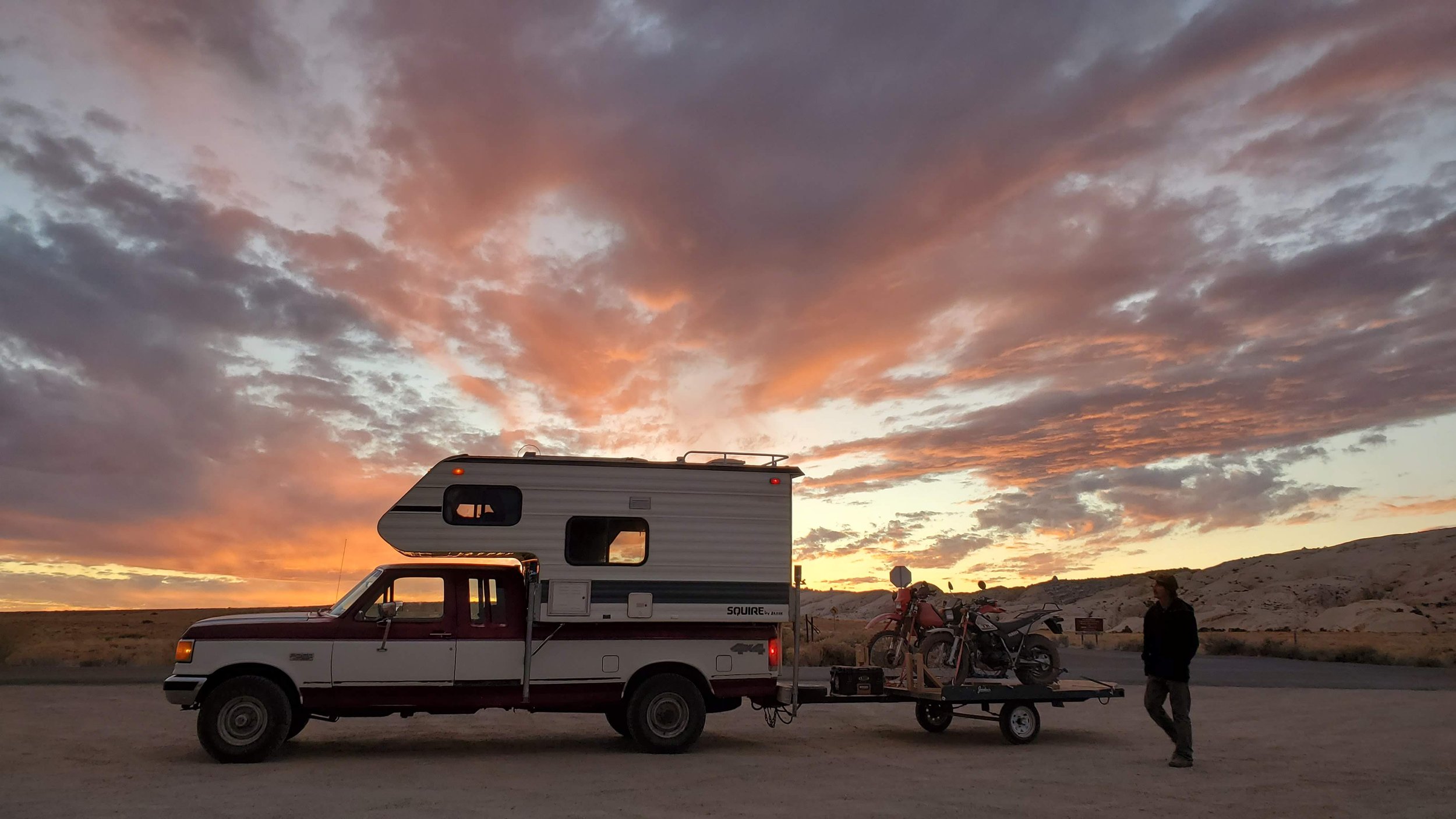 camper and dirtbikes sunset wide.jpeg