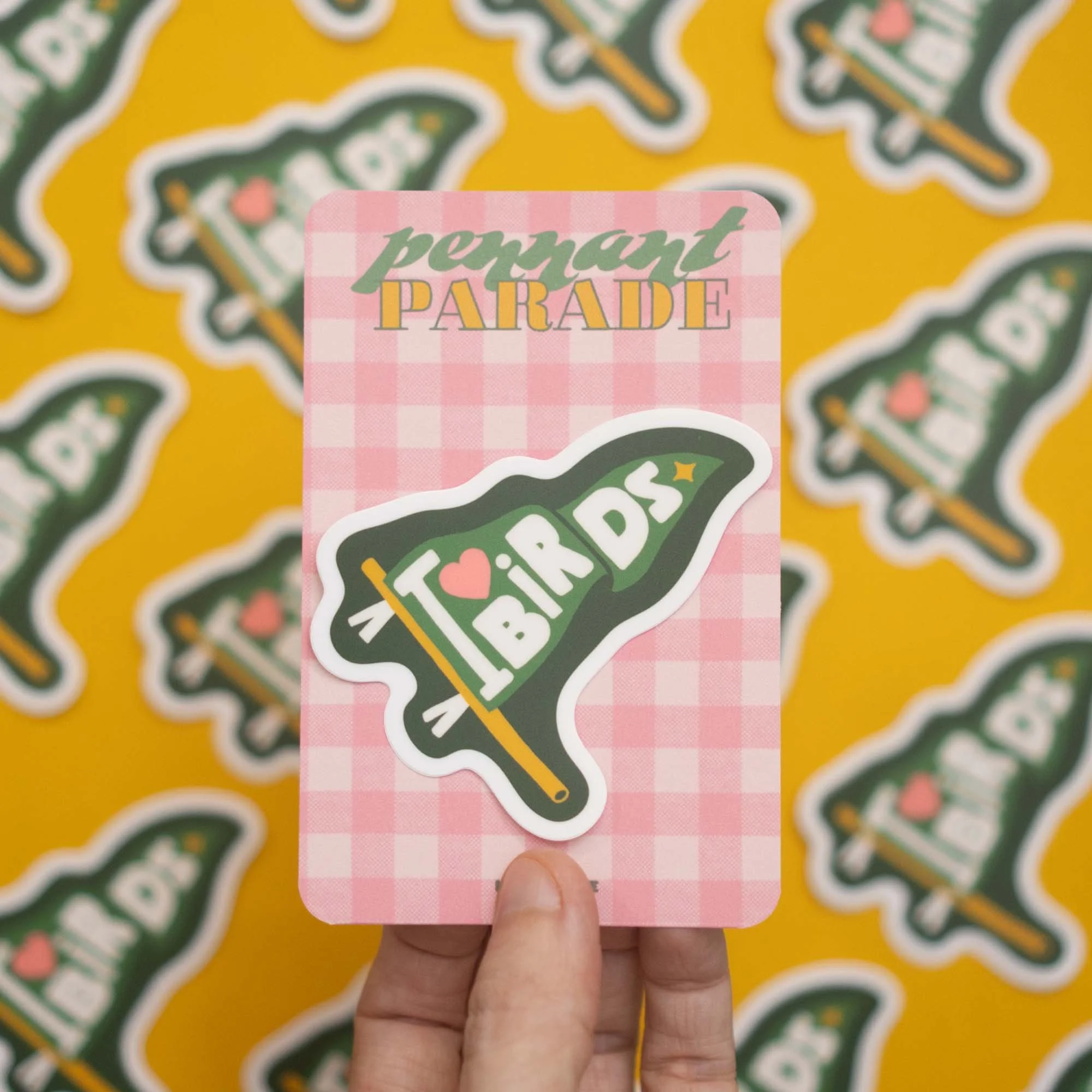 Vinyl sticker of a pennant that reads I Love Birds