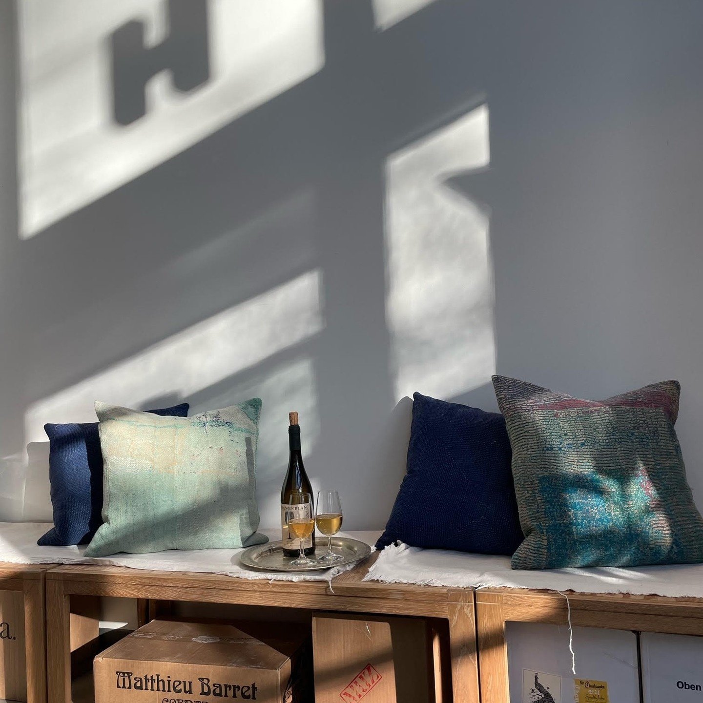 Along the Burke Gilman where it meets the Lake Washington ship canal, lies a slice of promenade with a signature red umbrella that seems out of time and place. If you have ever poked your head into @imperfetta_seattle you would promptly be greeted by