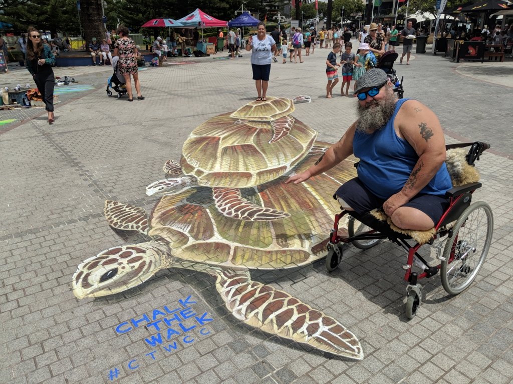 ctwcc-3d-chalk-art-turtle-pose-wheelchair.jpeg