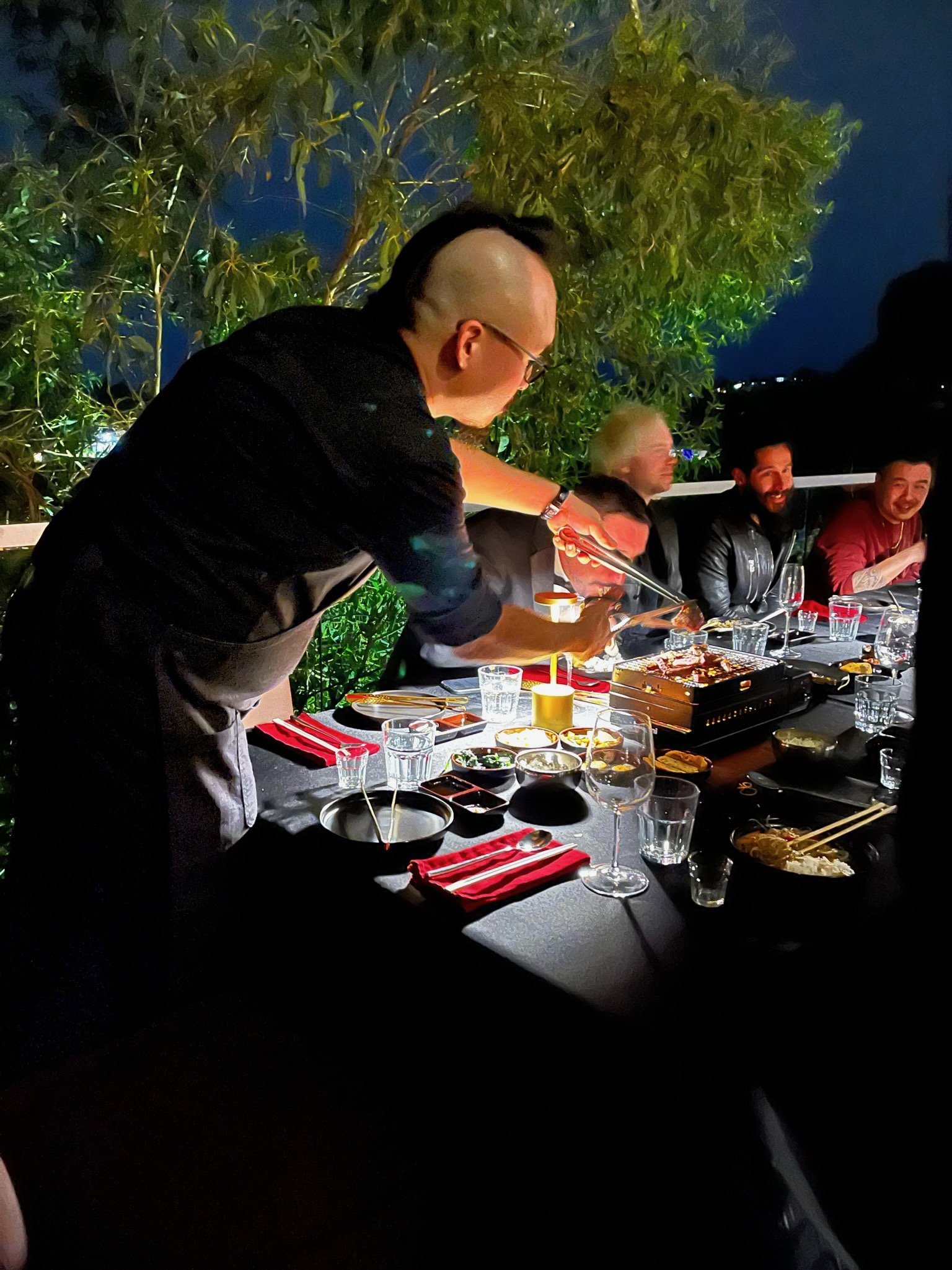 Signature Korean BBQ catering service by Chef John Bach, featuring live grilling and personalized plating at events in Los Angeles