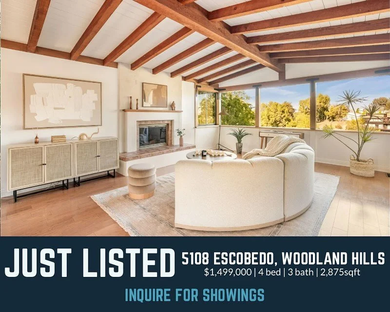 This stunning Mid-Century Modern delivers Palm Springs vibes in the heart of the city. Sitting perched about the Boulevard with sweeping views, bright interiors, exposed beams, and walls of glass, the open floor plan offers gorgeous sight lines and e