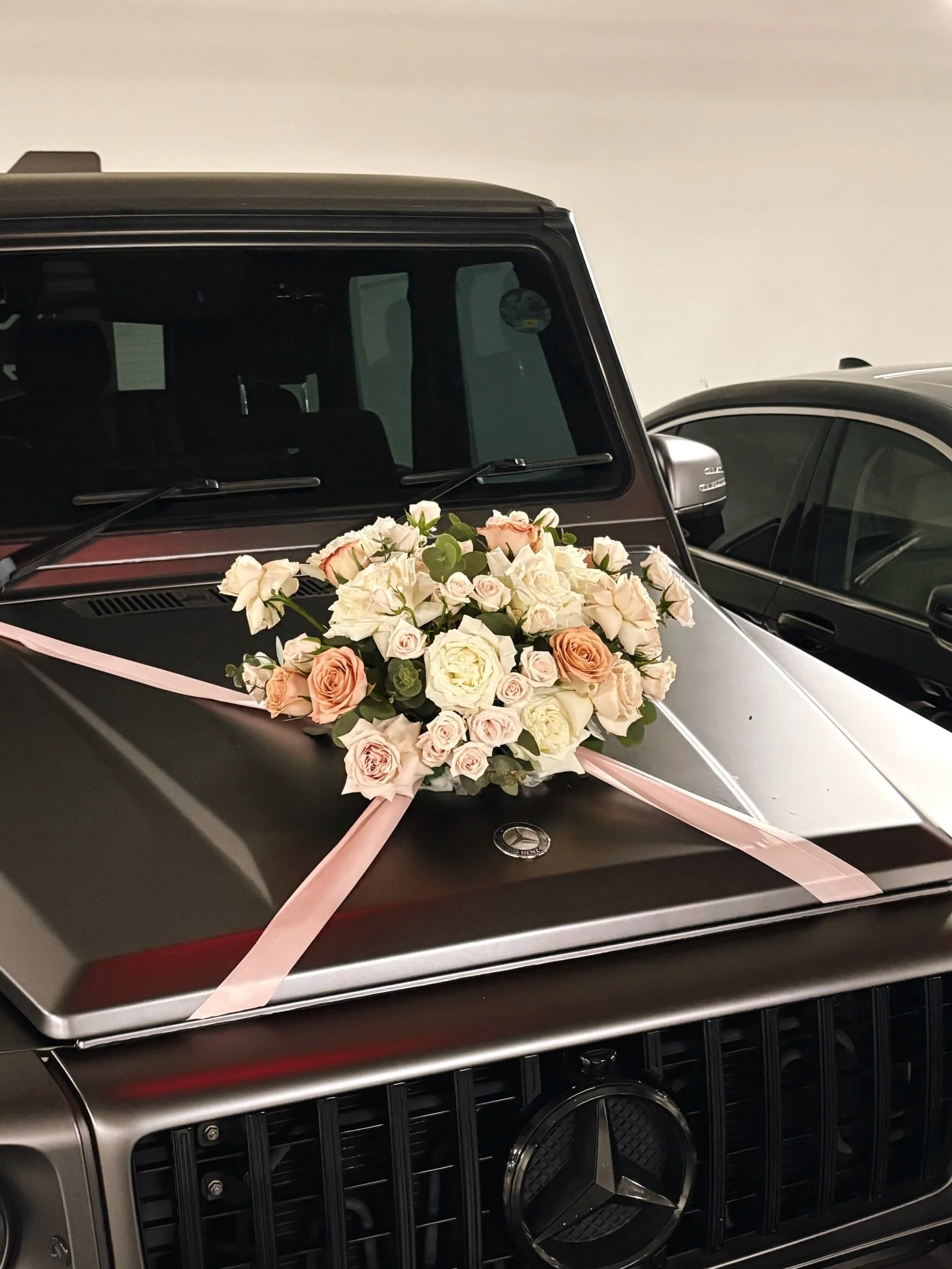 Romantic soft pink tones on matte grey g-wagon, in courtesy of @wunder.rides