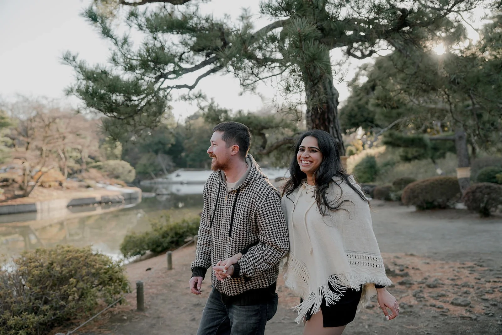 Couple walking in Tokyo garden during a Photo My Tokyo session
