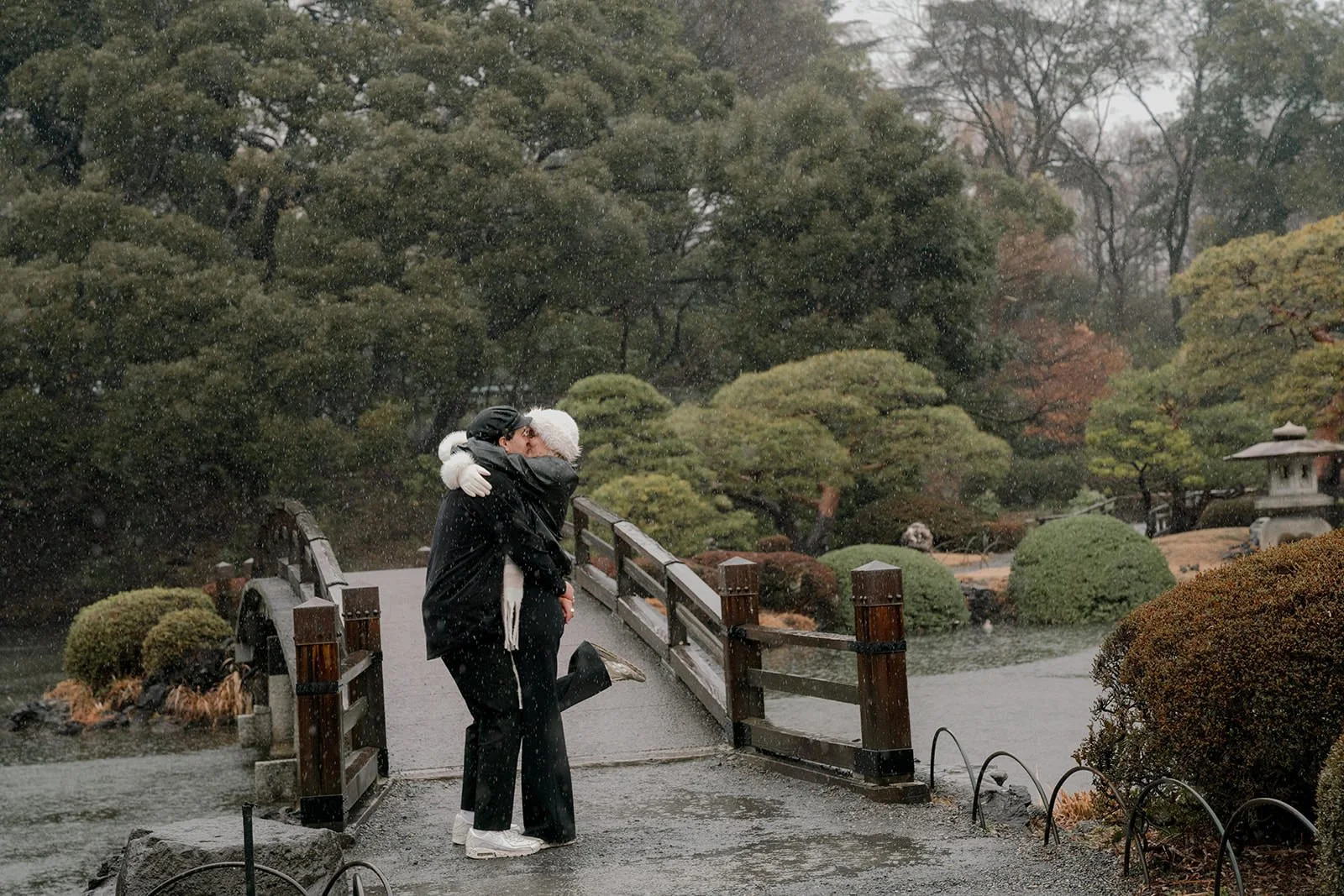 Couple photoshoot Tokyo heavy rain winter