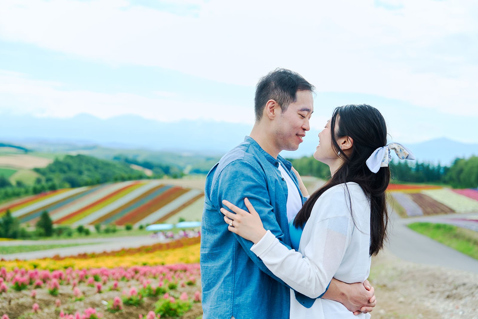 Proposal photoshoot at Shikisai-no Oka — summer flower field