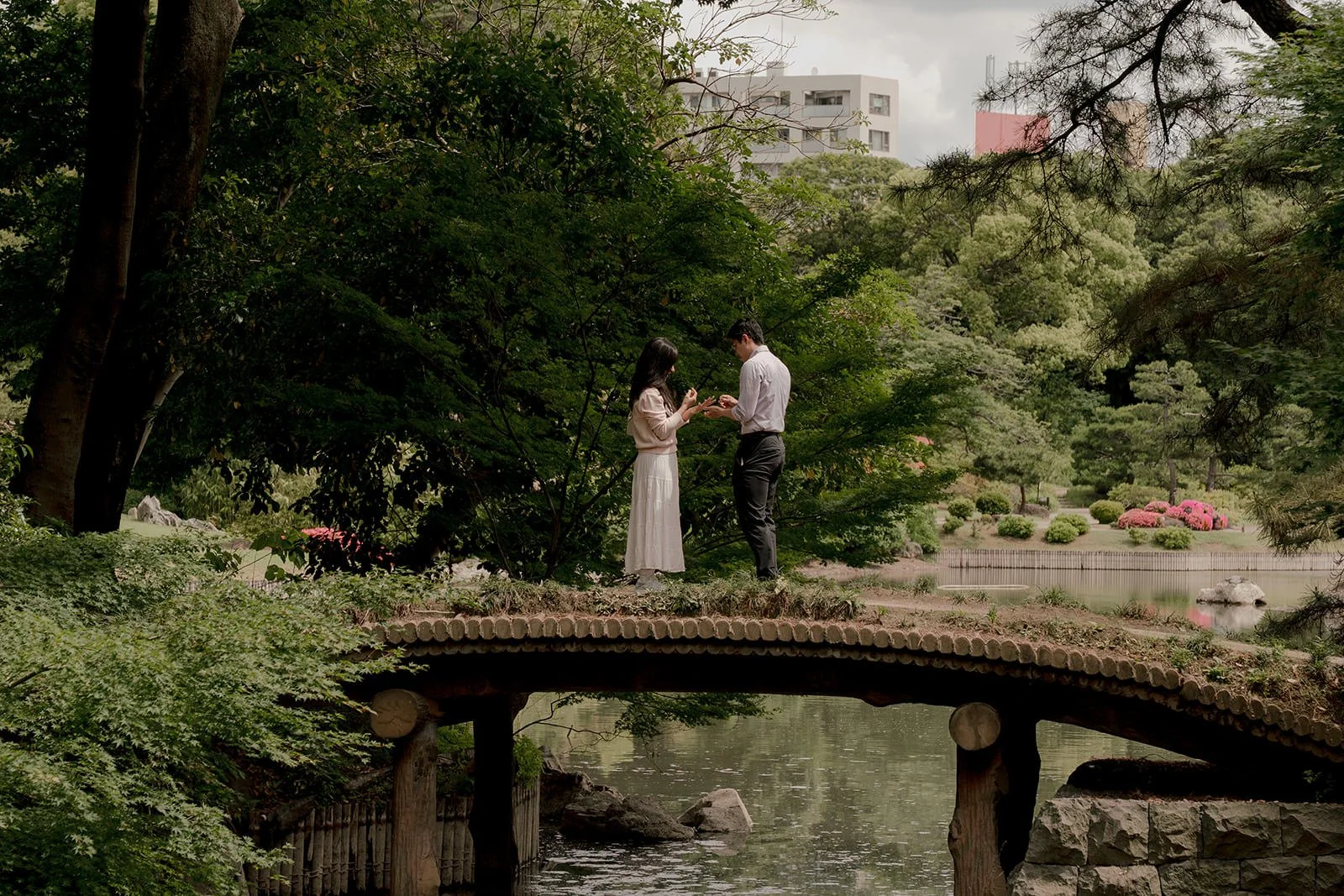 Couple walking Rikugien Gardens after proposal