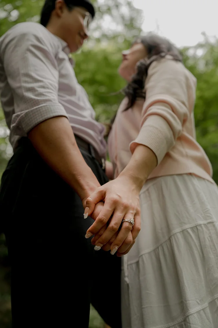 Couple embracing after proposal, Rikugien Gardens