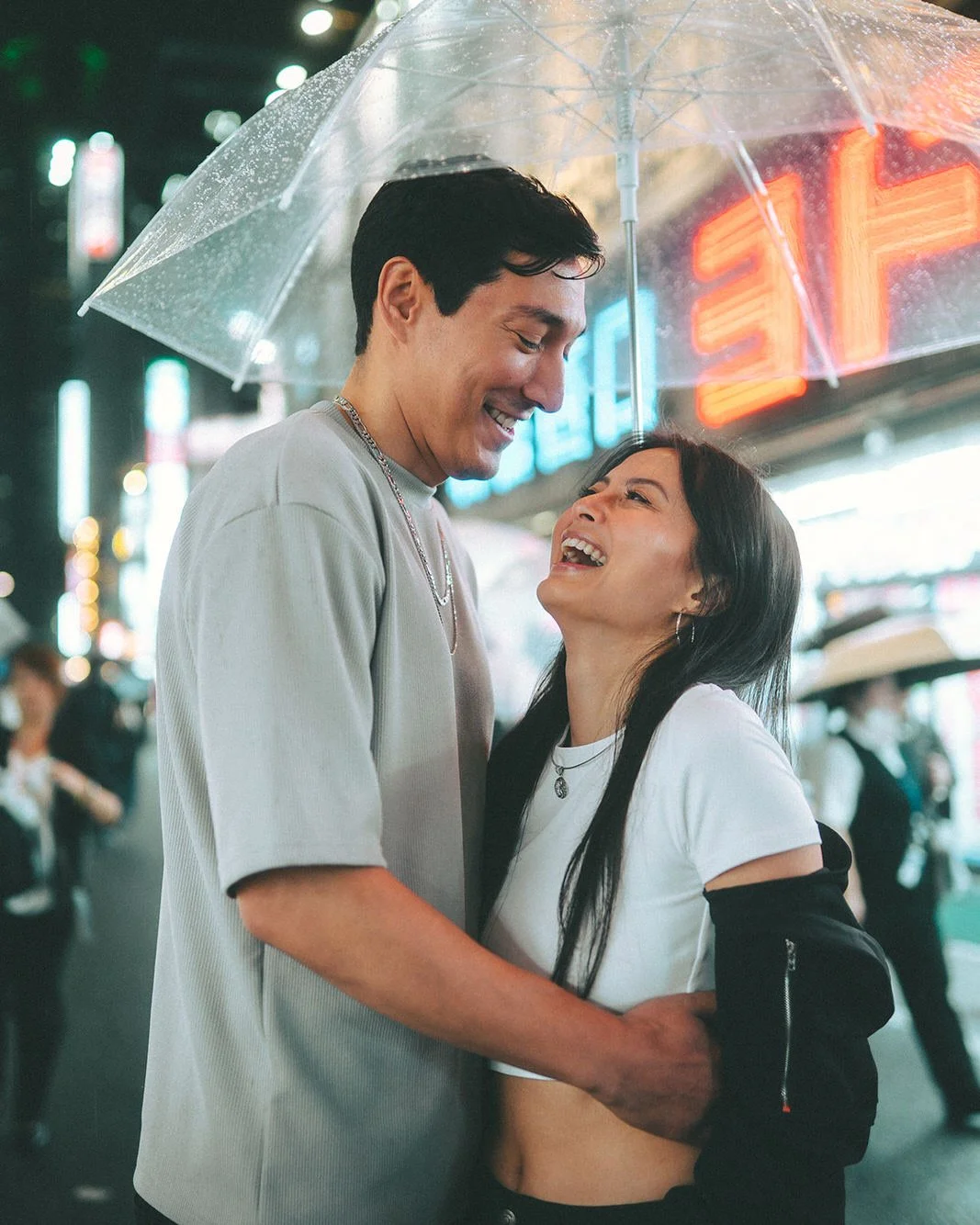 Couples photoshoot in Shinjuku at night, Tokyo, summer evening