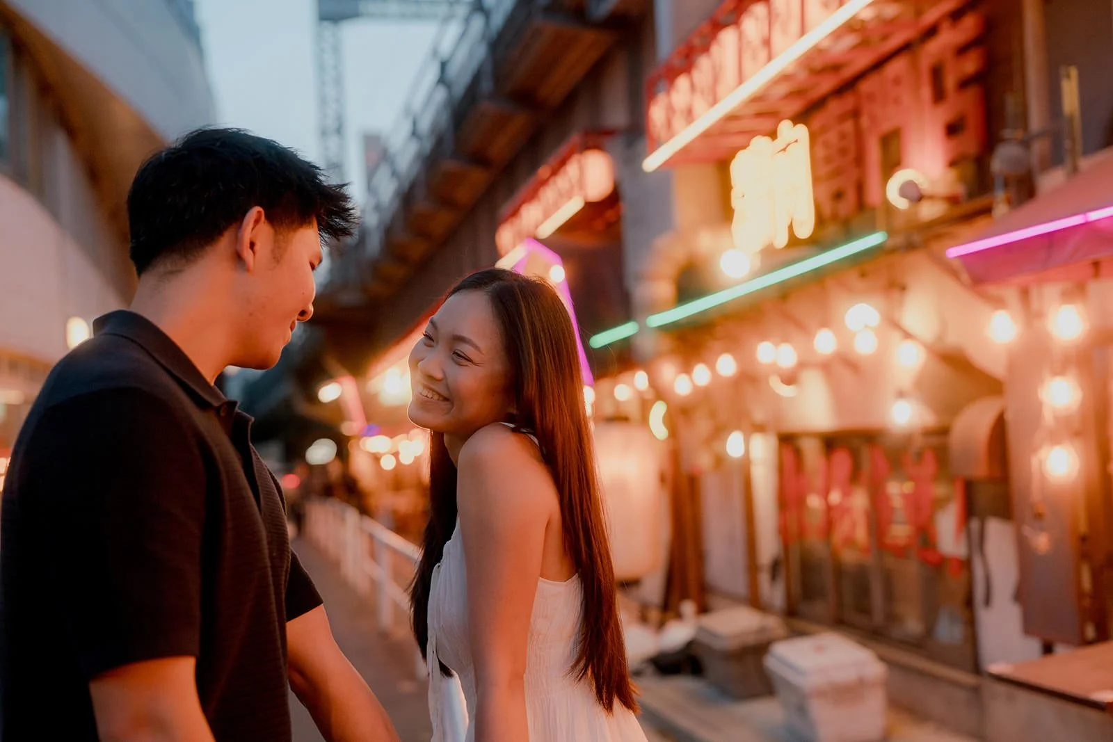 Couples photoshoot in Yurakucho at night, Tokyo, spring evening